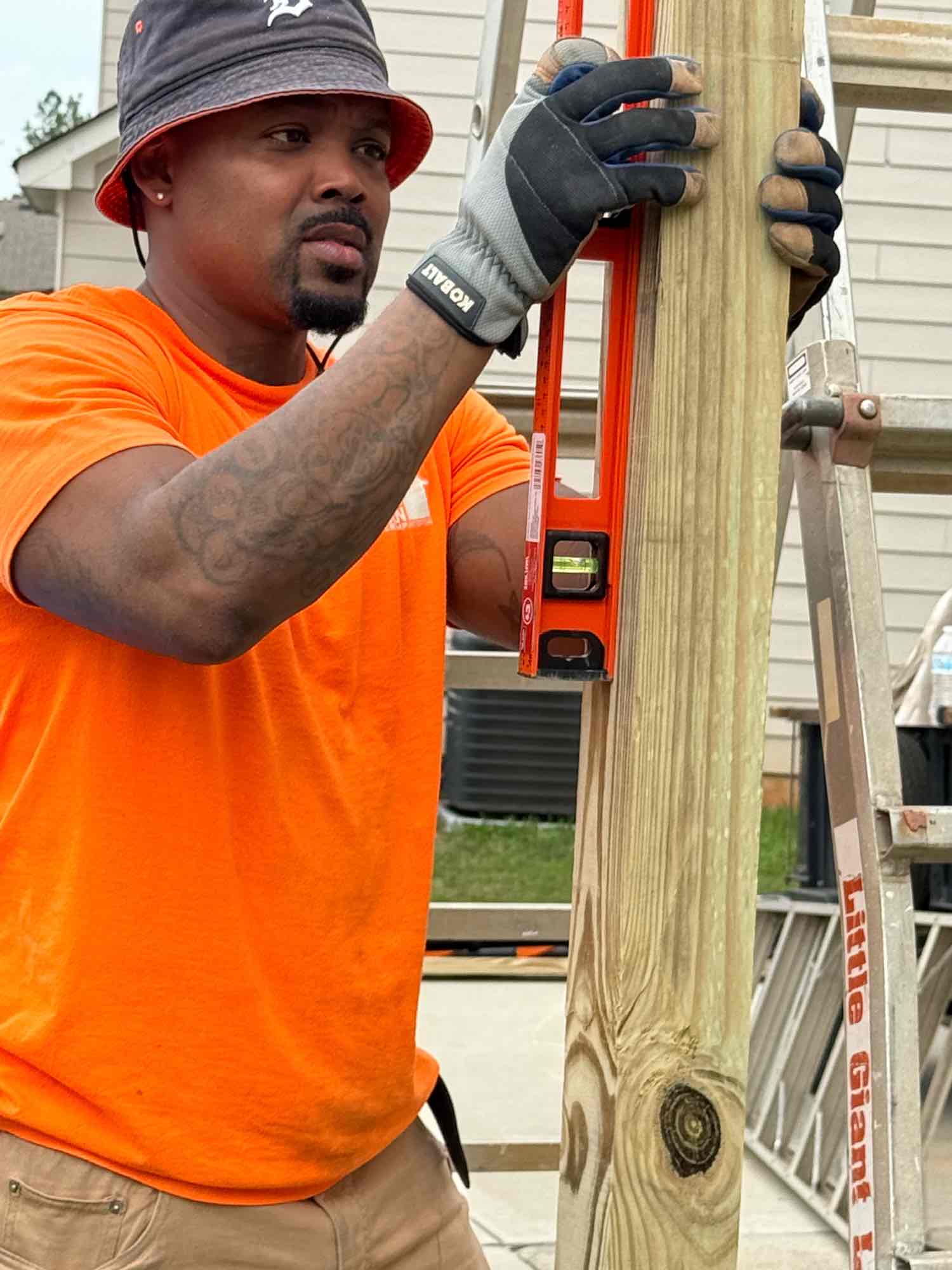 Vincent Jr. working on a timber post