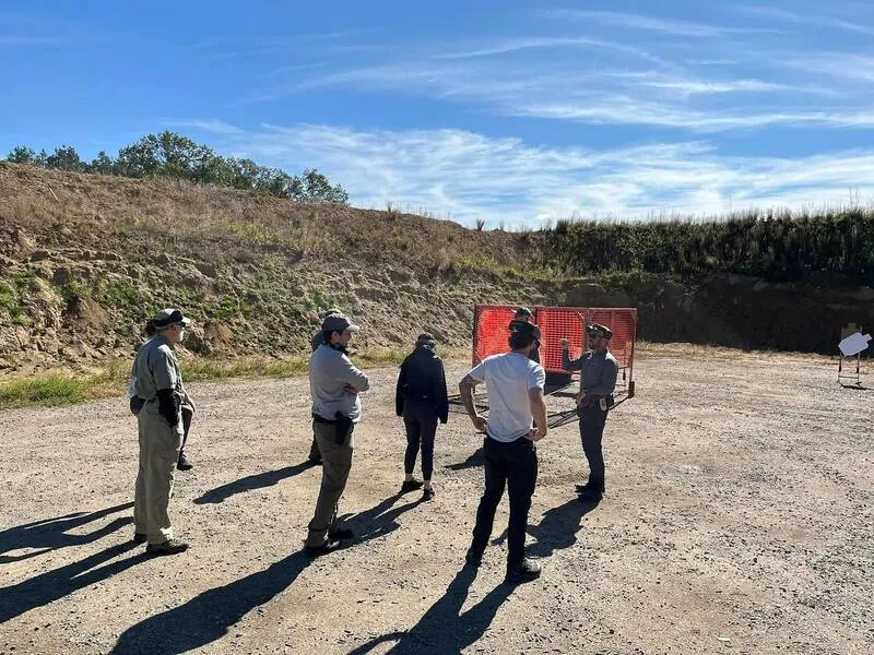 Students training on an outdoor range line