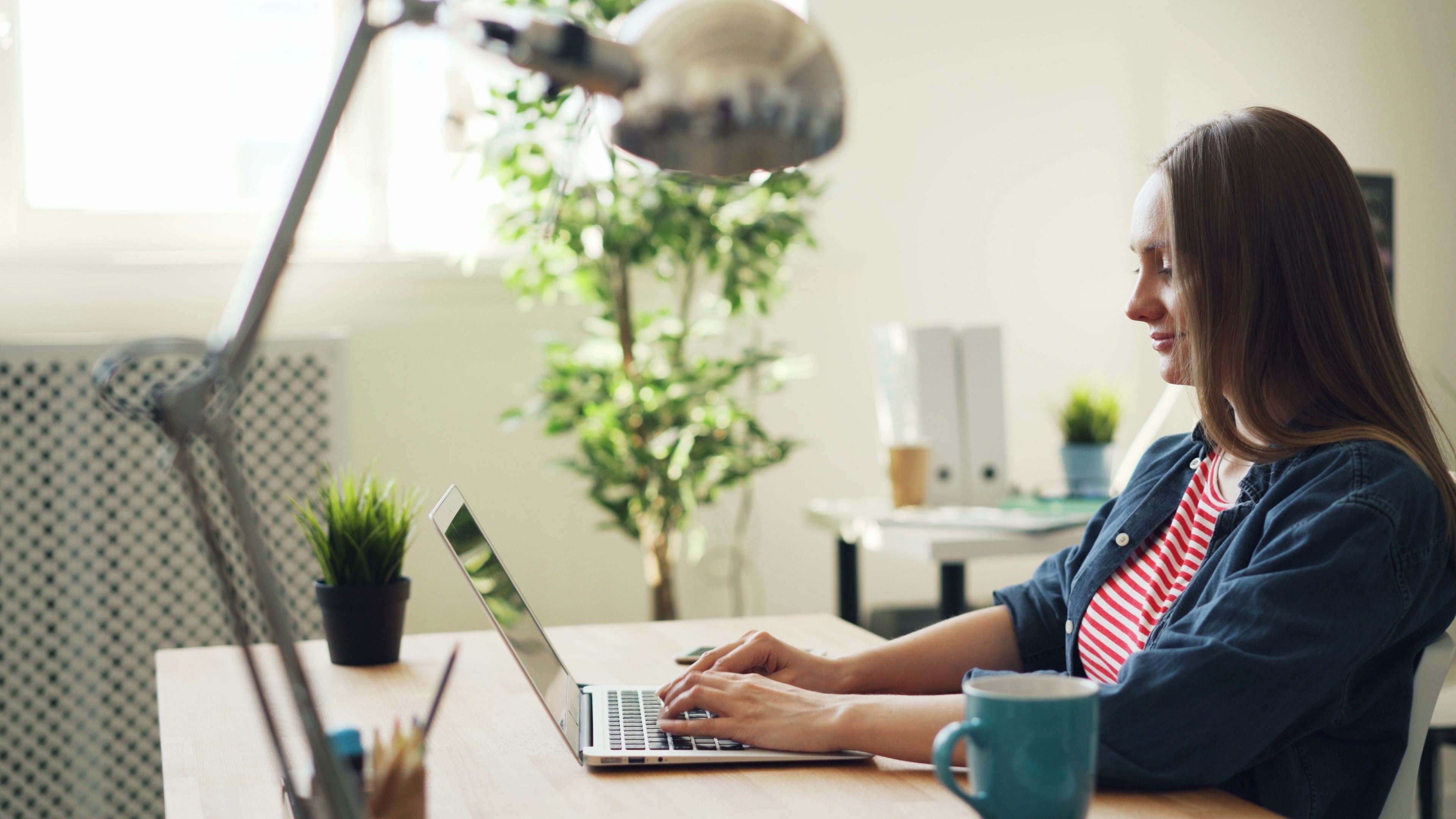 Person listening quietly during an online hypnosis session