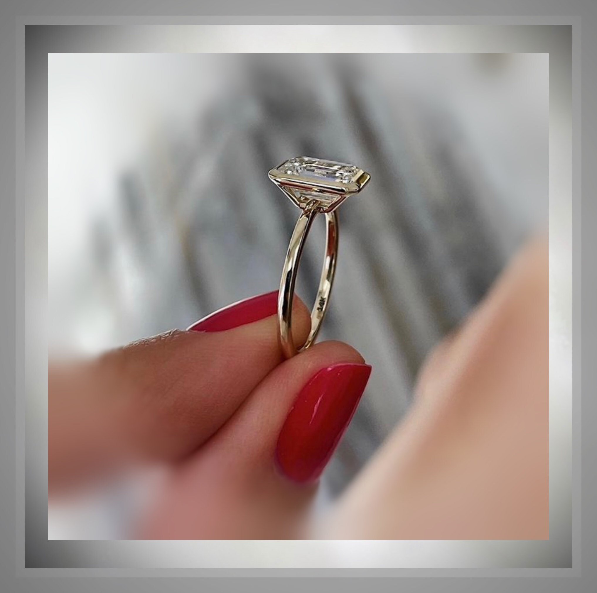 Detailed view of an antique-style engagement ring with diamond accents