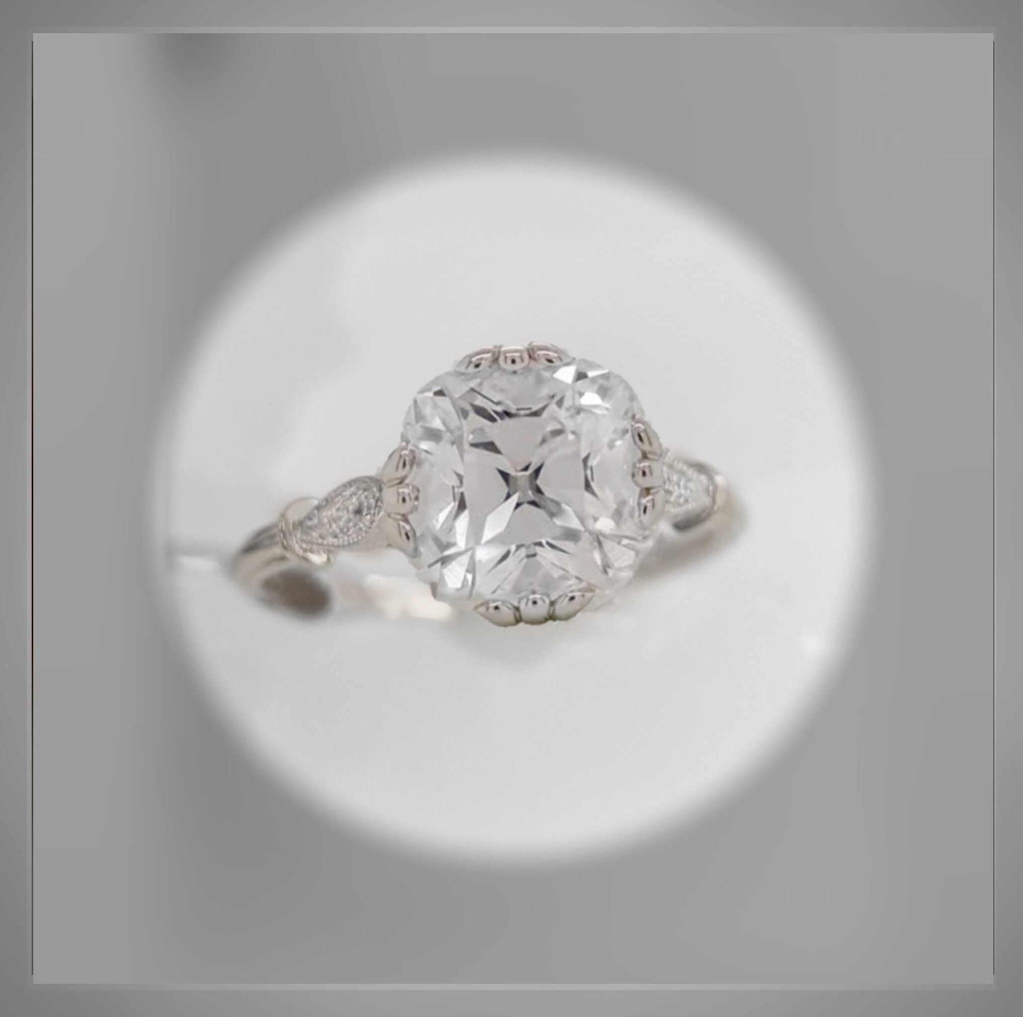 Antique-inspired diamond engagement ring in a silver setting