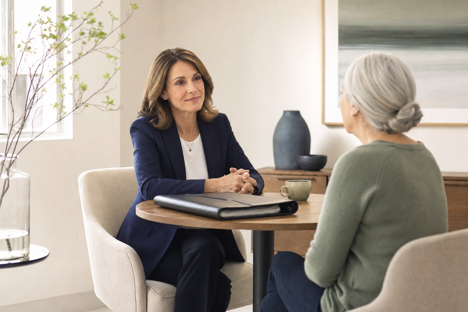 Advisor talking with an older client