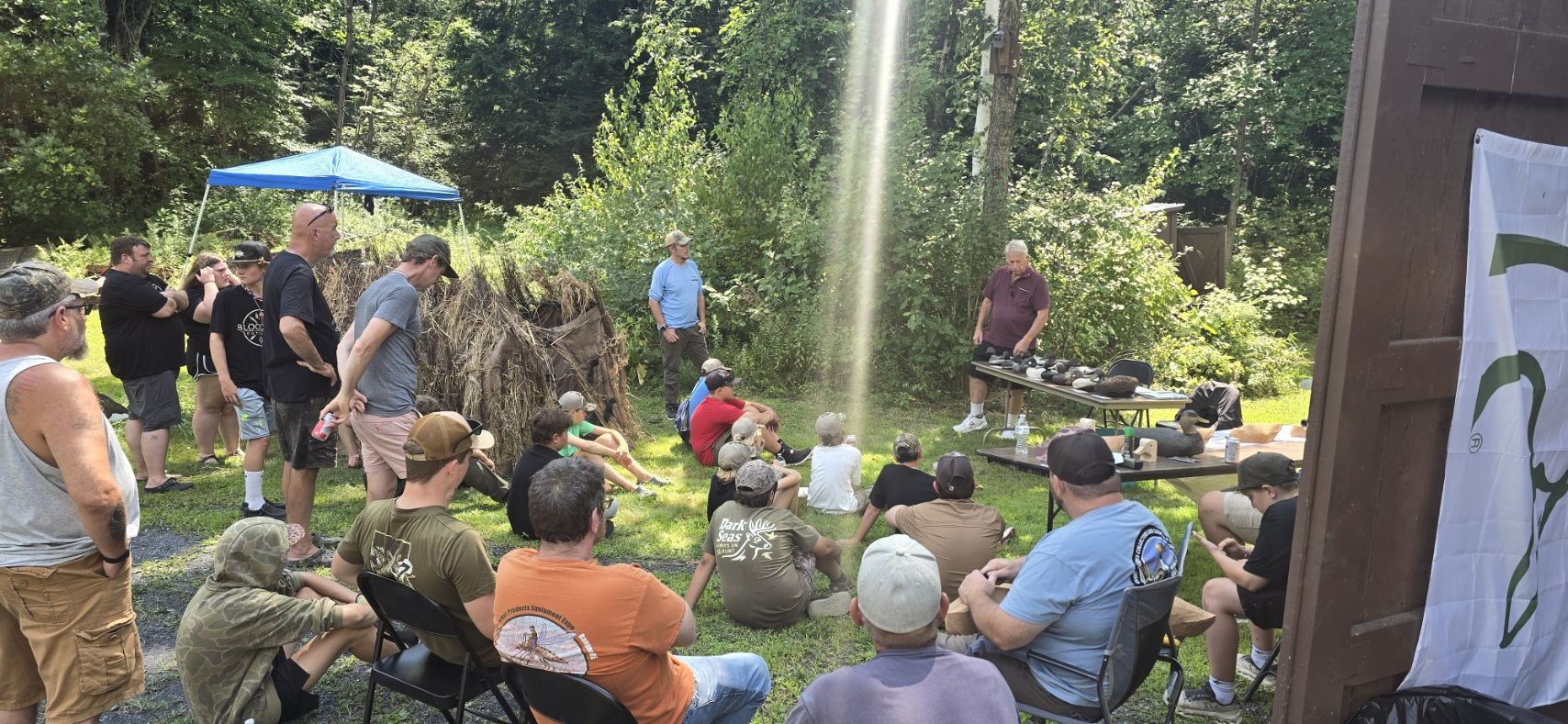 A community group learning about wildlife outdoors