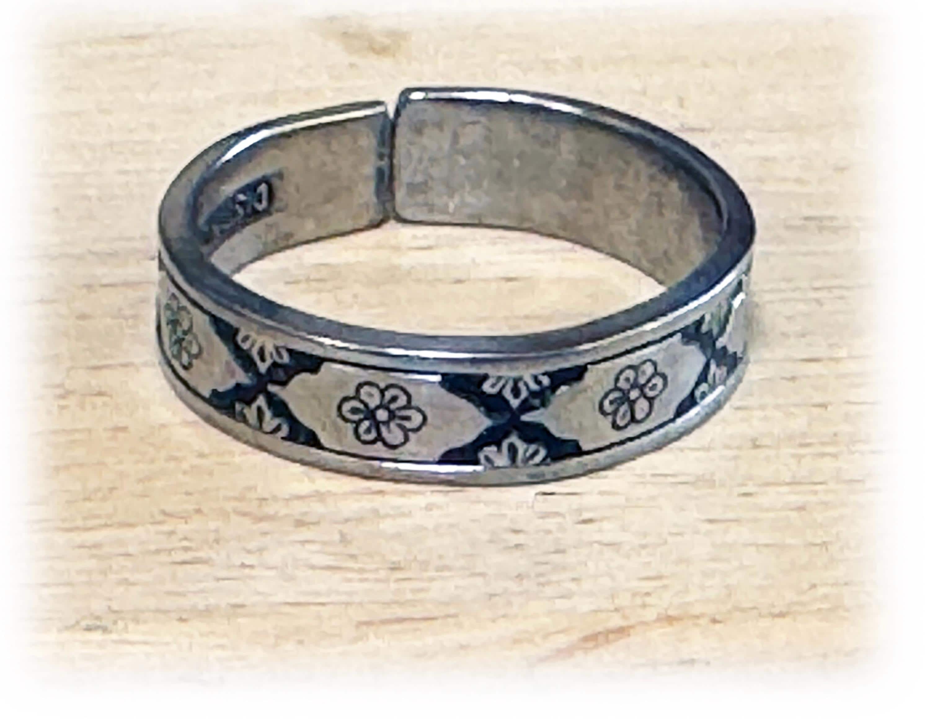 1960s MCM Spoon Ring: Stainless Steel Band with Black Floral Design, Sz 12.75