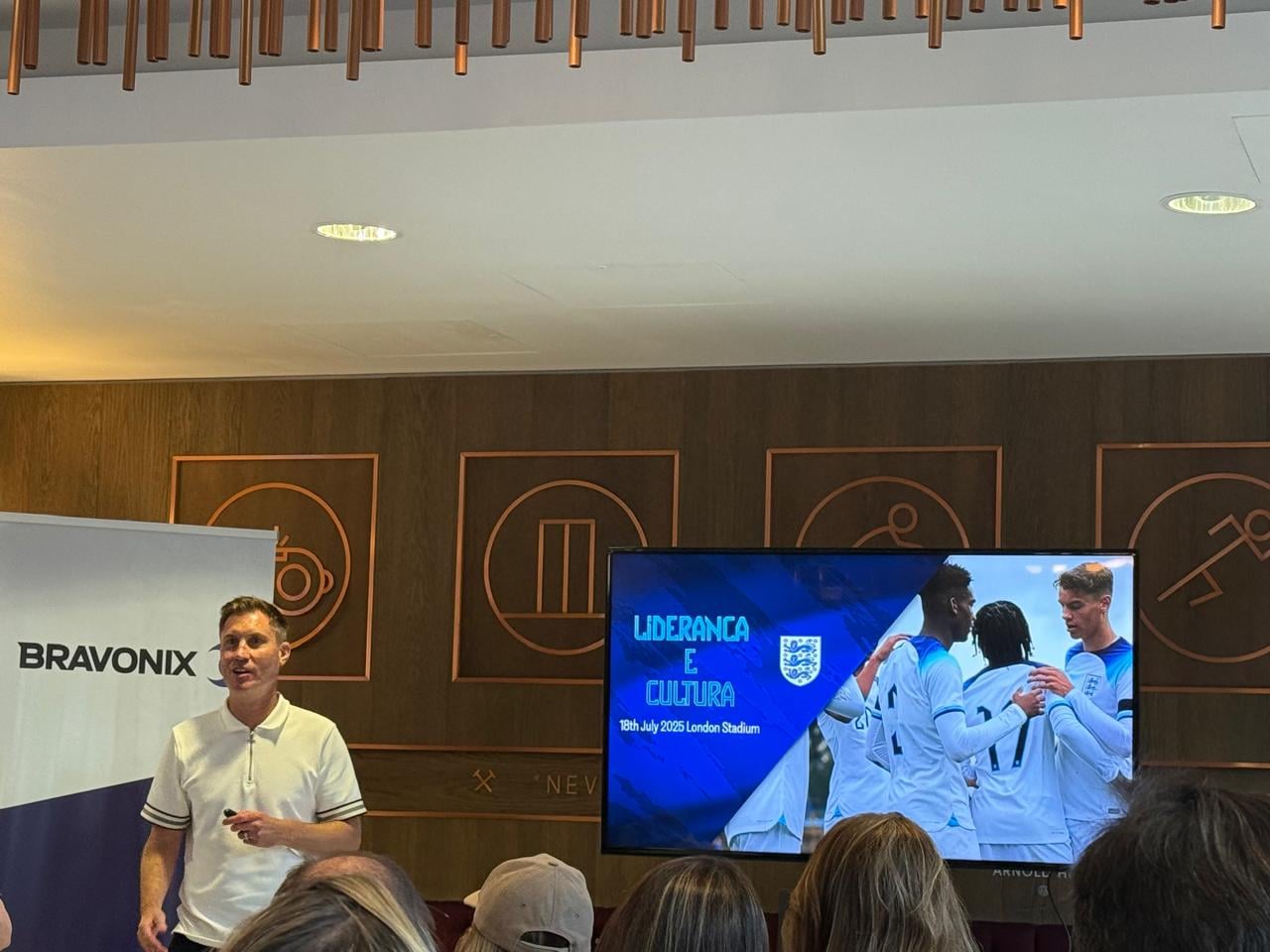 Guests listening to a leadership talk at a Football Business Club event