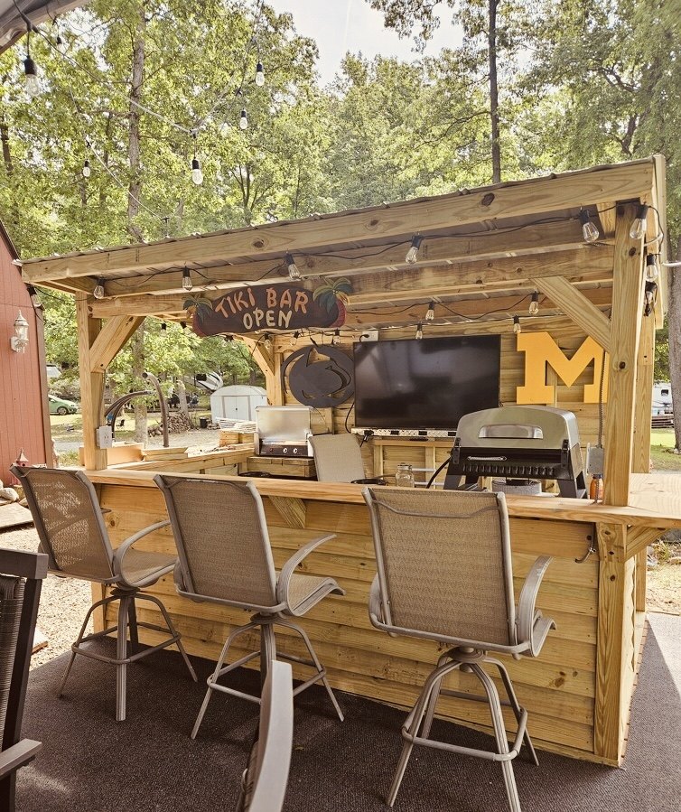 Covered outdoor bar with lounge seating