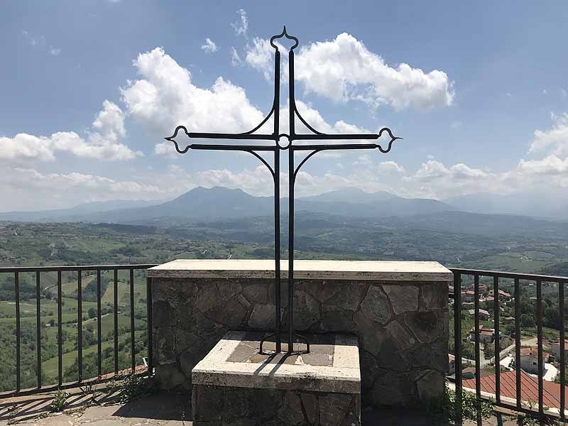 Iron cross overlooking Montefusco, Italy