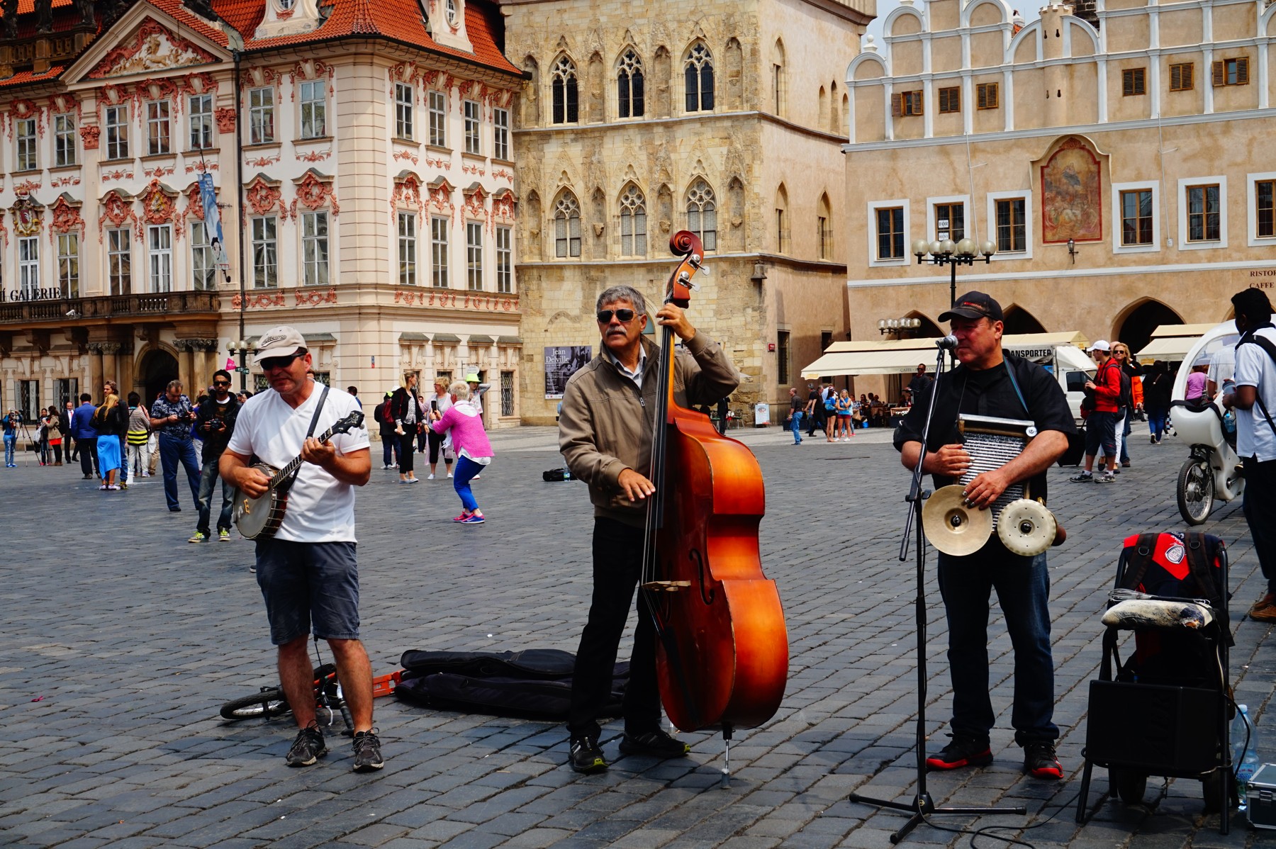 Street musicians playing in Prague’s Old Town Square.