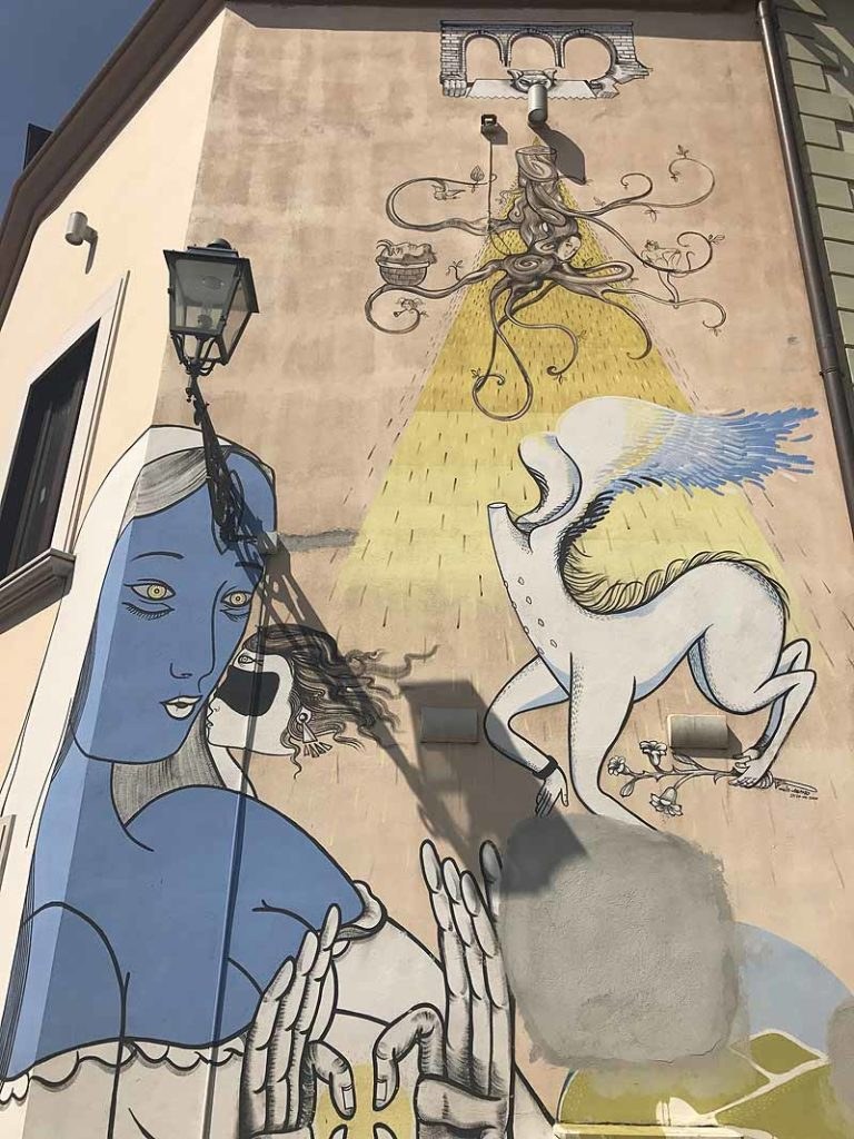Travel photograph of street art meets parallel worlds