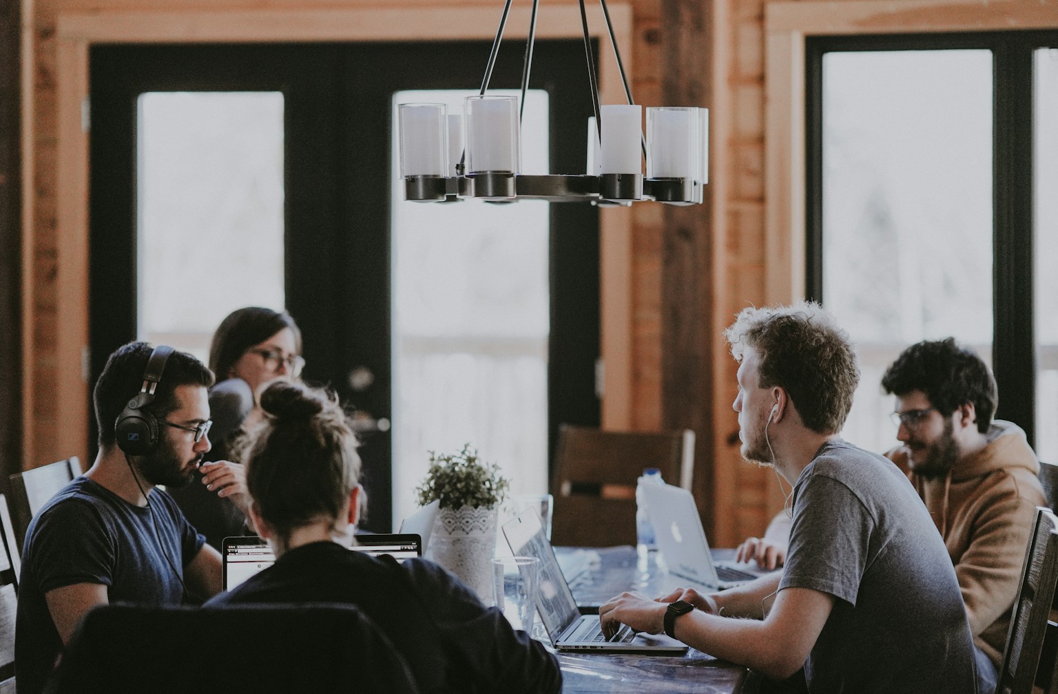 Small business team meeting around a worktable