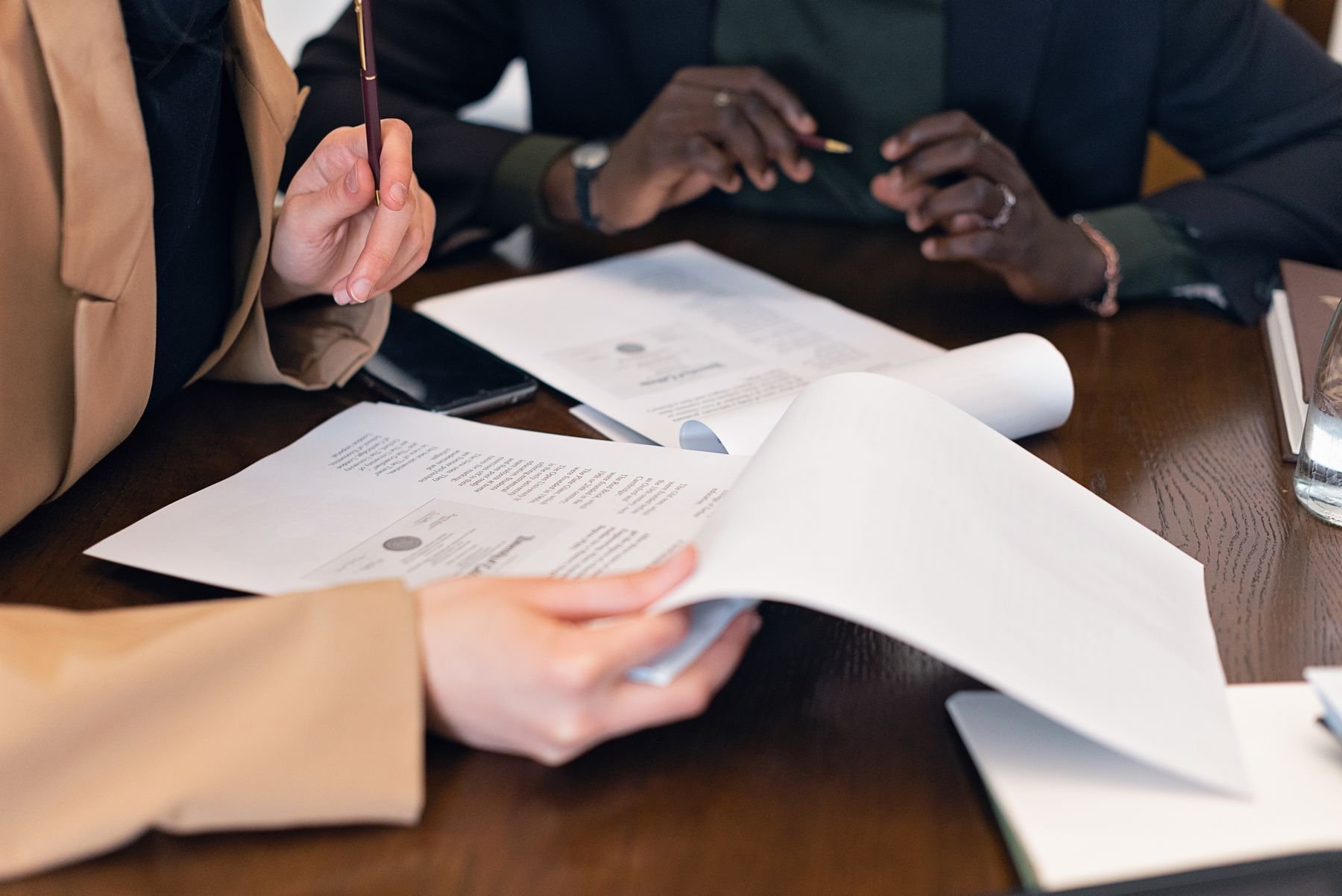 Business owners reviewing a document at a table