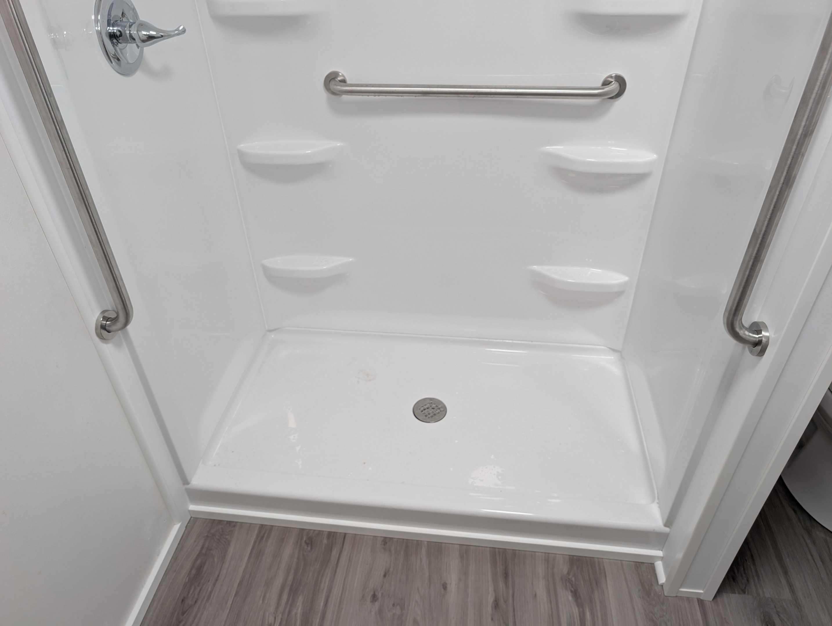 New shower installation with safety grab bars
