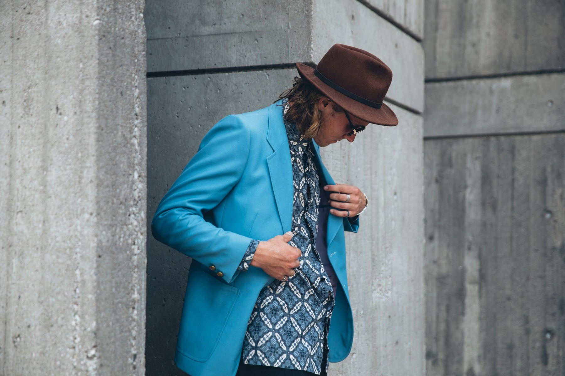 Menswear styled with a bright blue tailored jacket