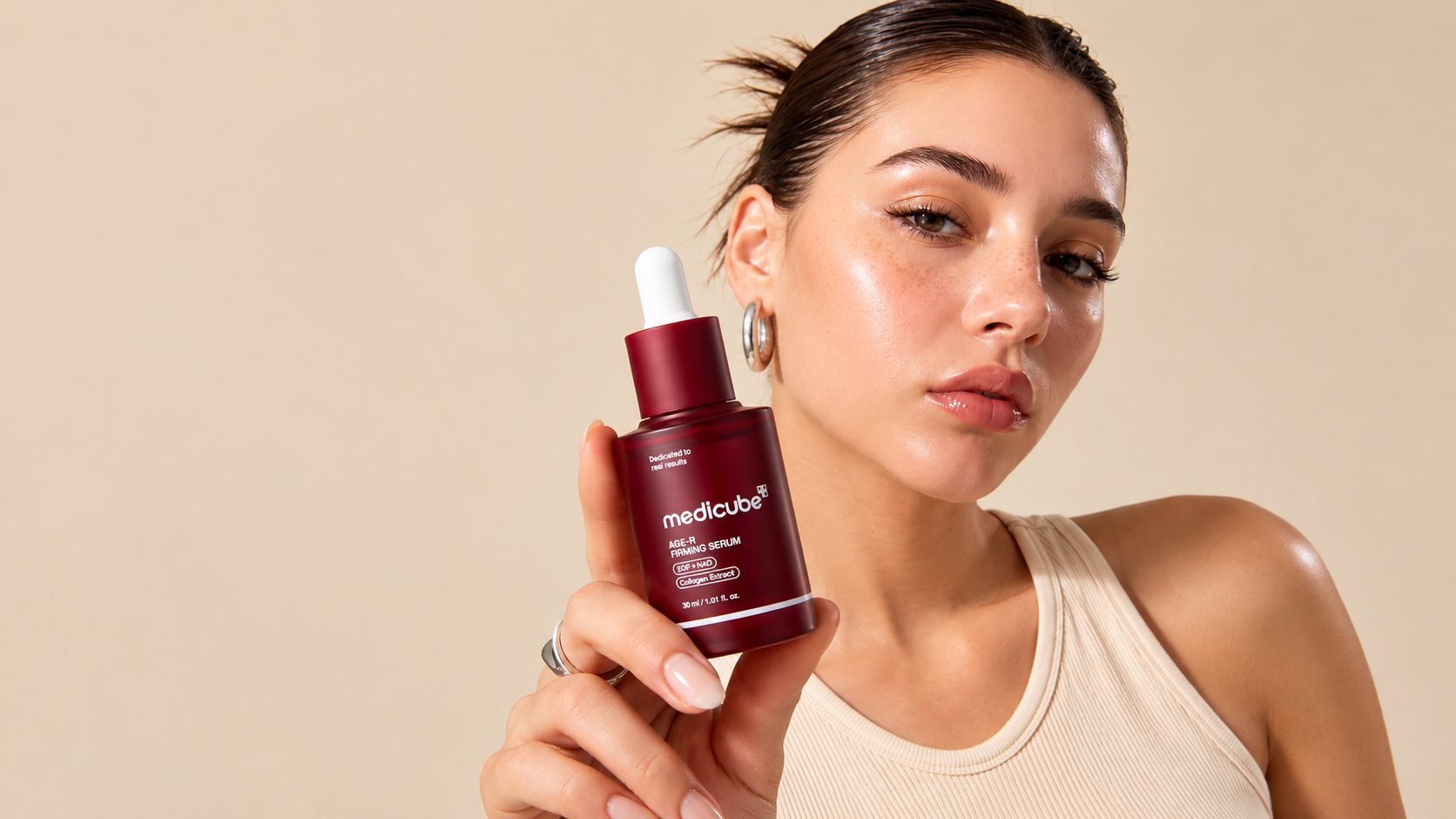 Beauty portrait with Medicube skincare serum