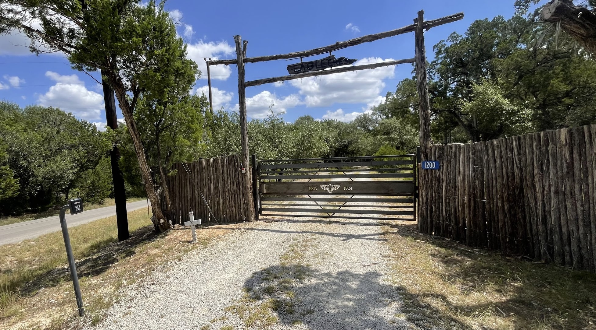 Driveway entrance gate with keypad access
