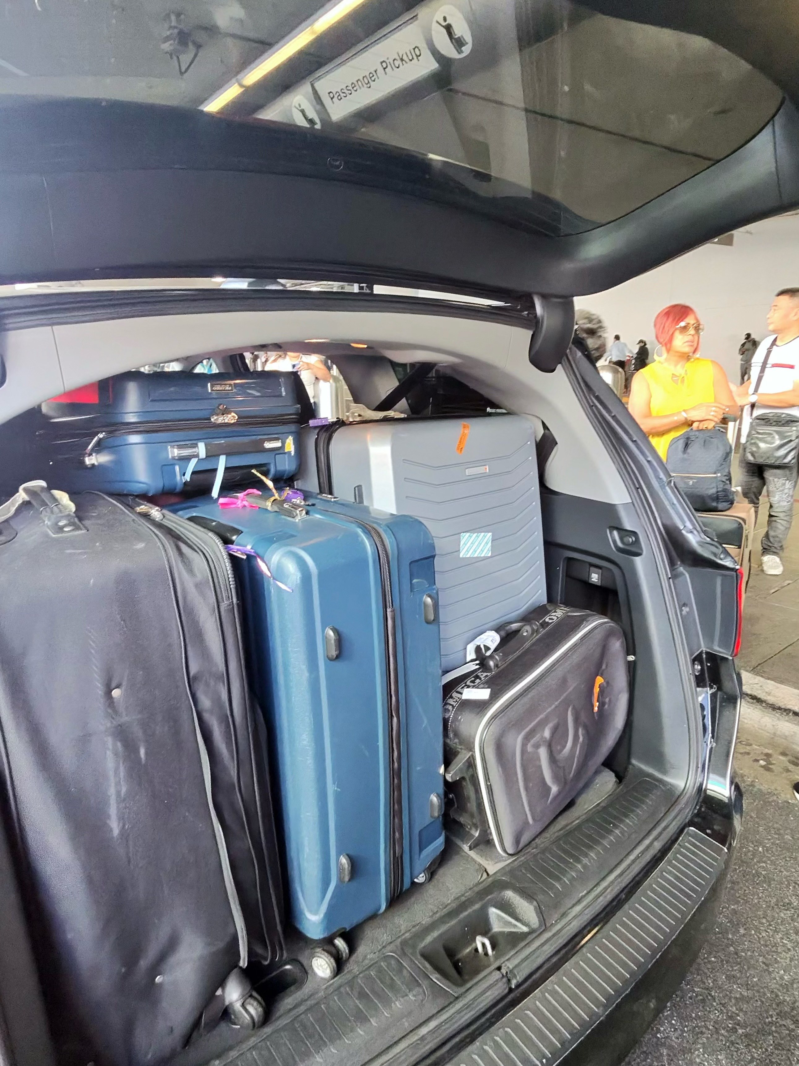 Private vehicle arriving for an LAX curbside pickup
