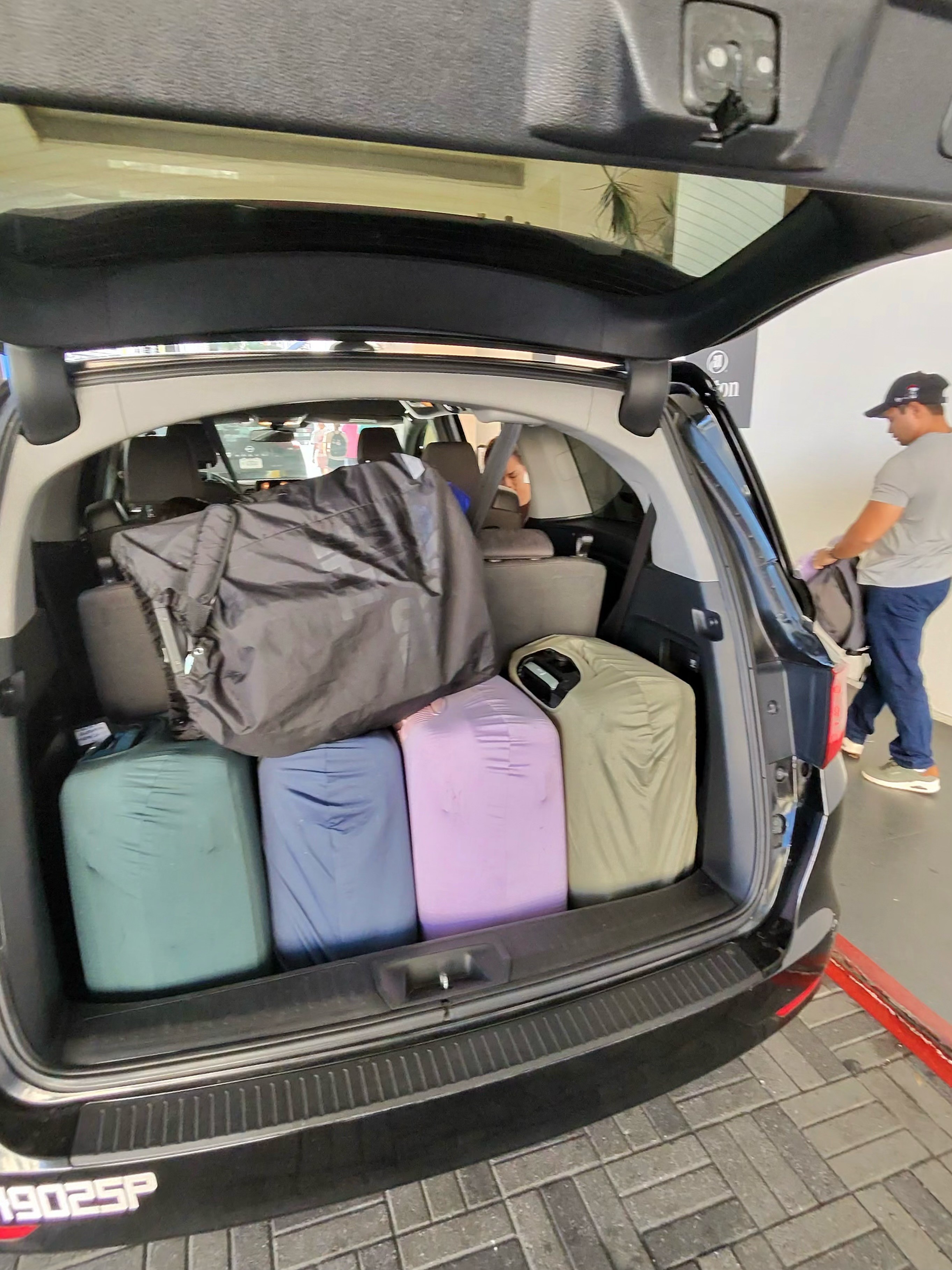 Actual passenger luggage loaded into a City Cruze L.A. Honda Odyssey