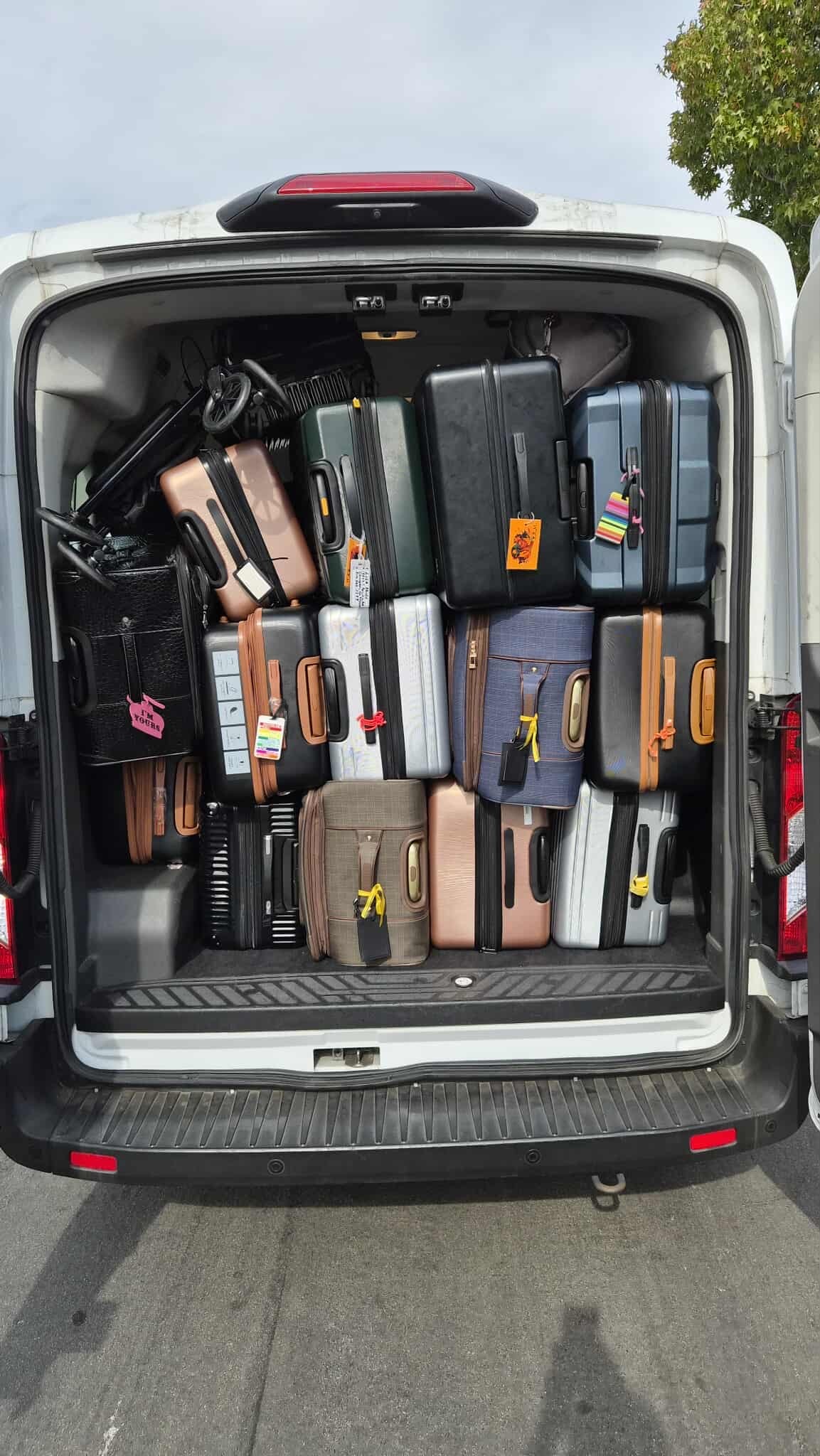 Actual passenger luggage loaded in a City Cruze LA Ford Transit