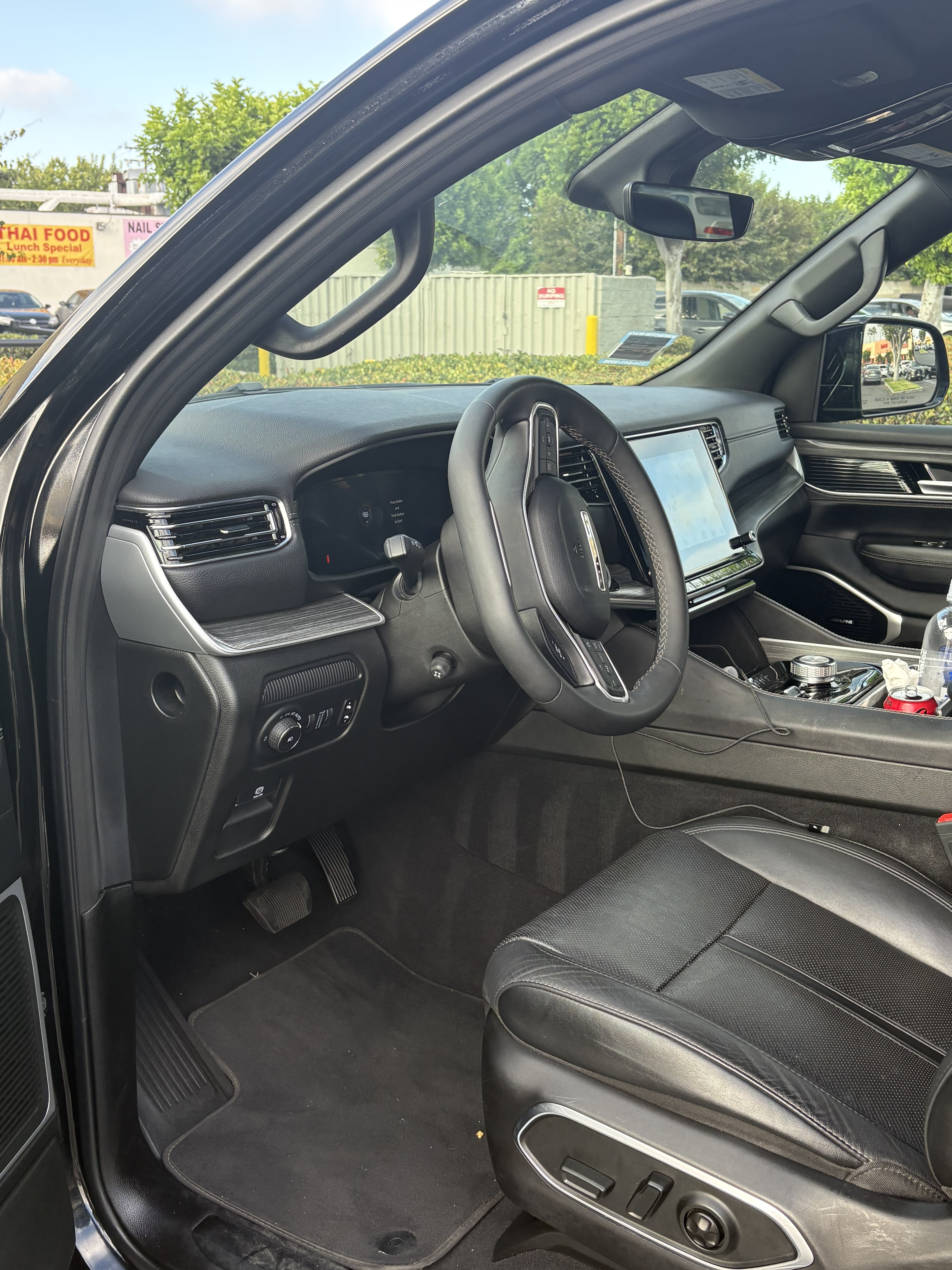 Front passenger space in a City Cruze LA Jeep Wagoneer L