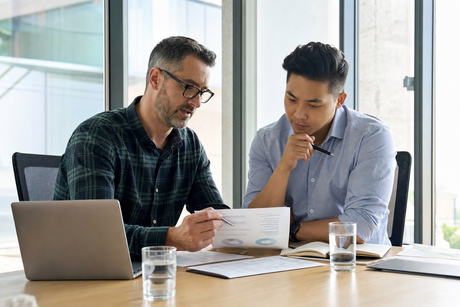 Sales manager coaching an account executive through an account plan