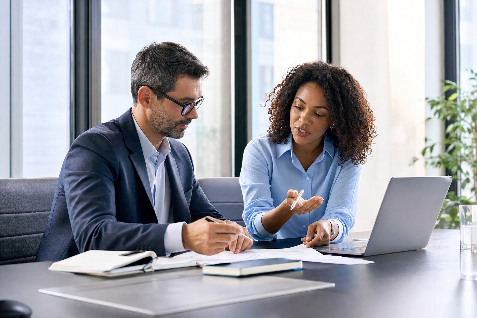 Two B2B revenue leaders reviewing an account plan together