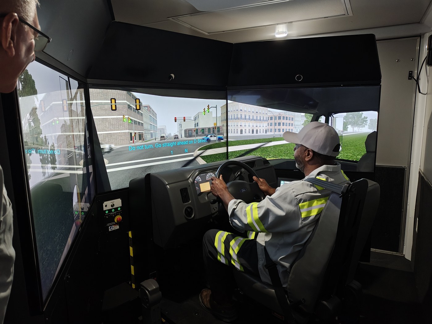 Driver working through a simulator scenario