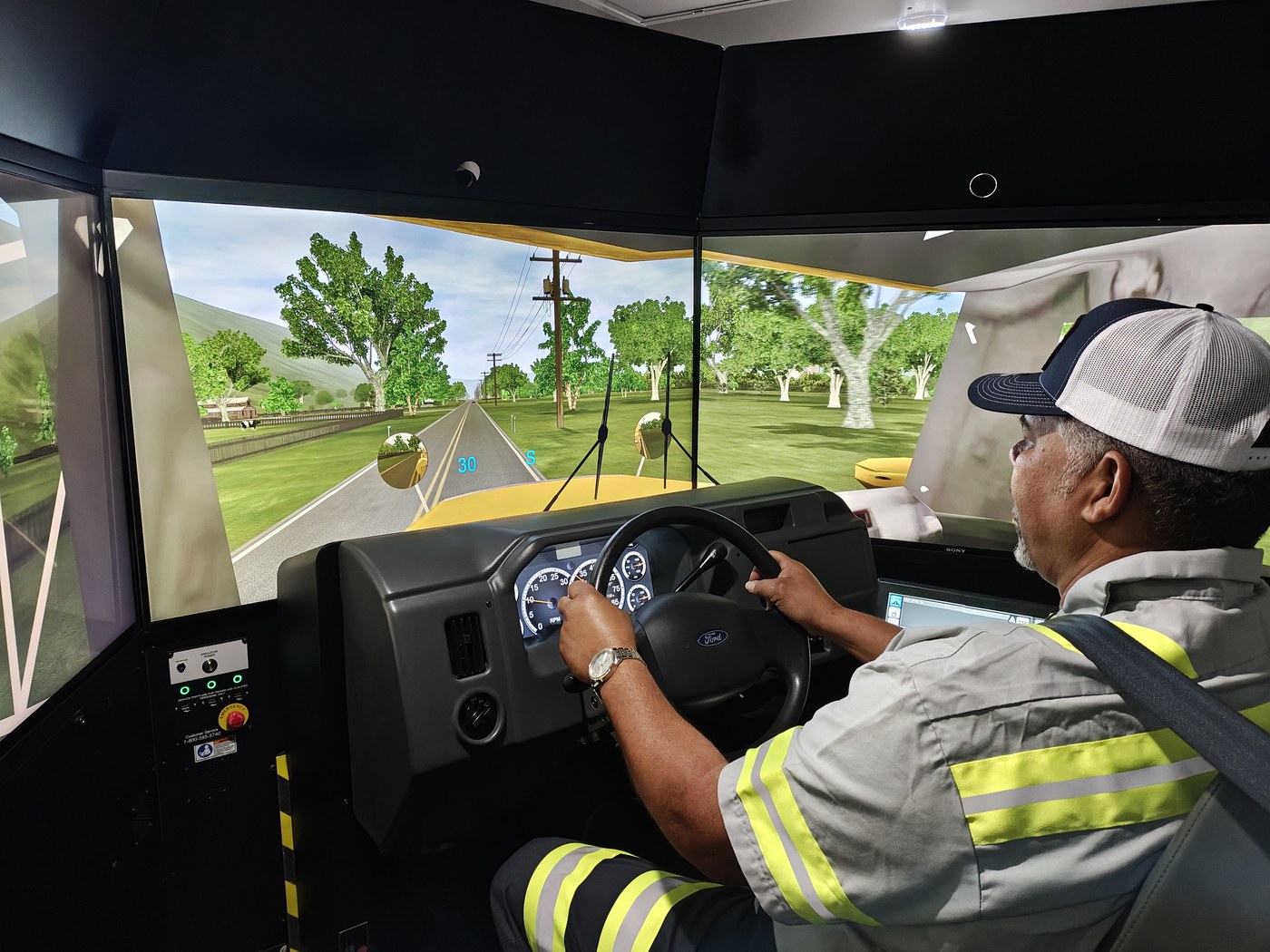 Driver using the simulator inside the mobile unit