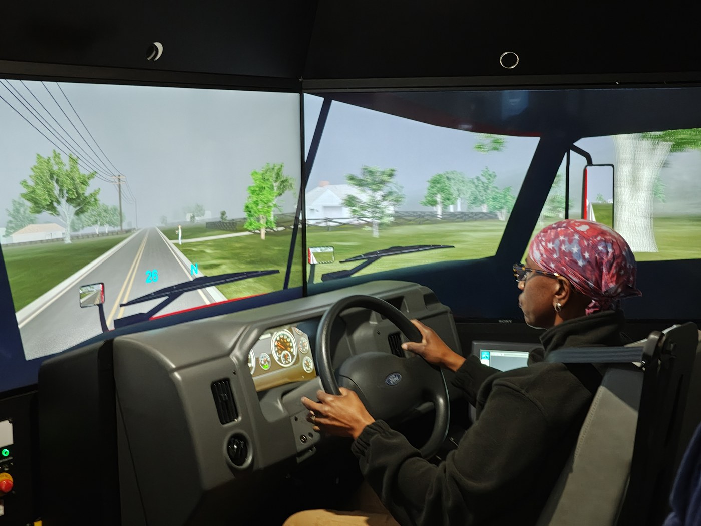 Participant practicing on the driving simulator