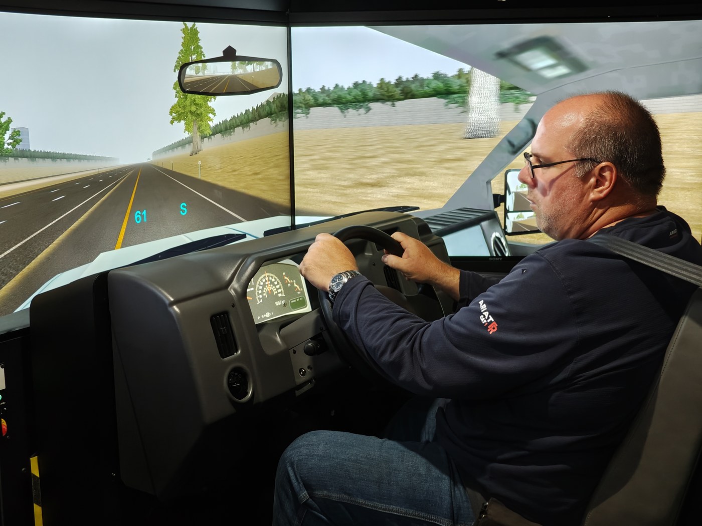 Participant at the driving simulator controls