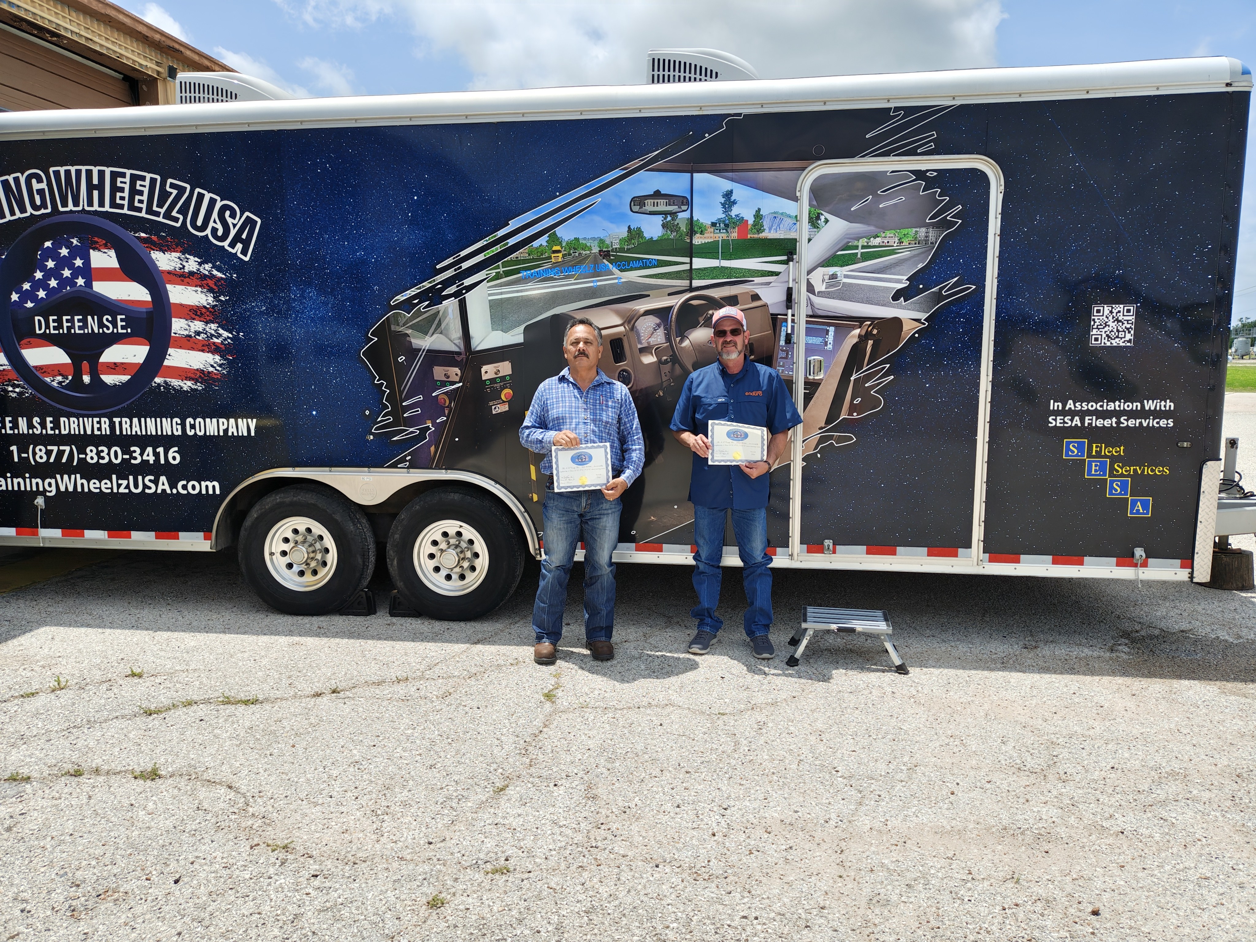 Training Wheelz USA team by the mobile training unit