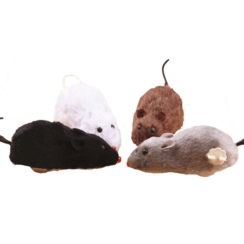 Wind-up mouse cat toy on a pale background