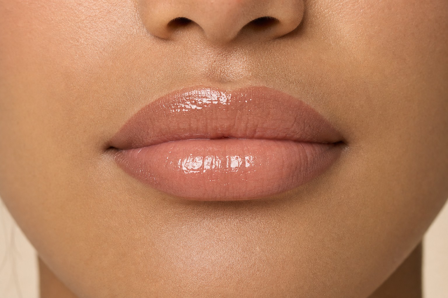 Warm beige nude glossy lips