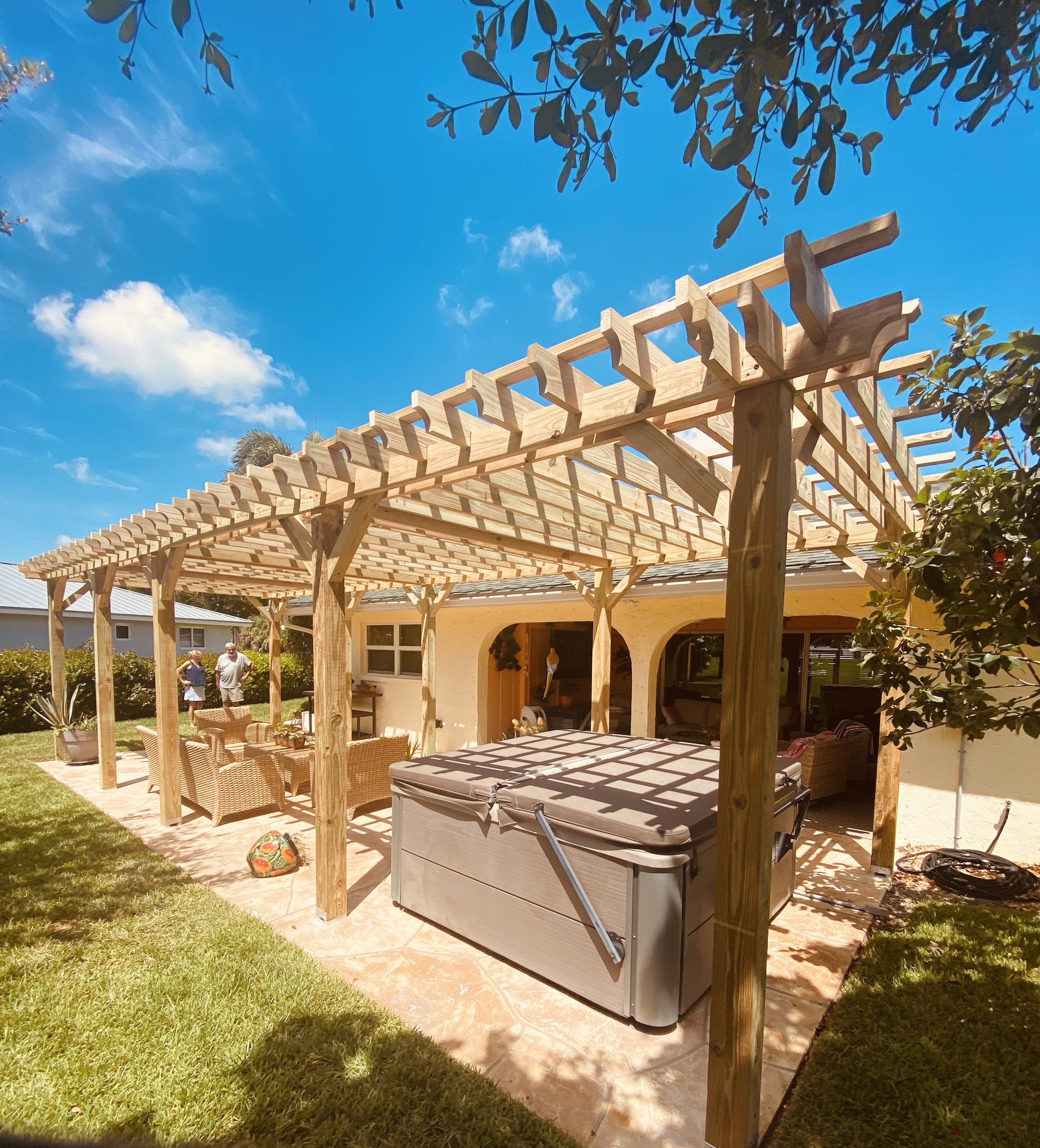 Long custom pergola over a Southwest Florida patio