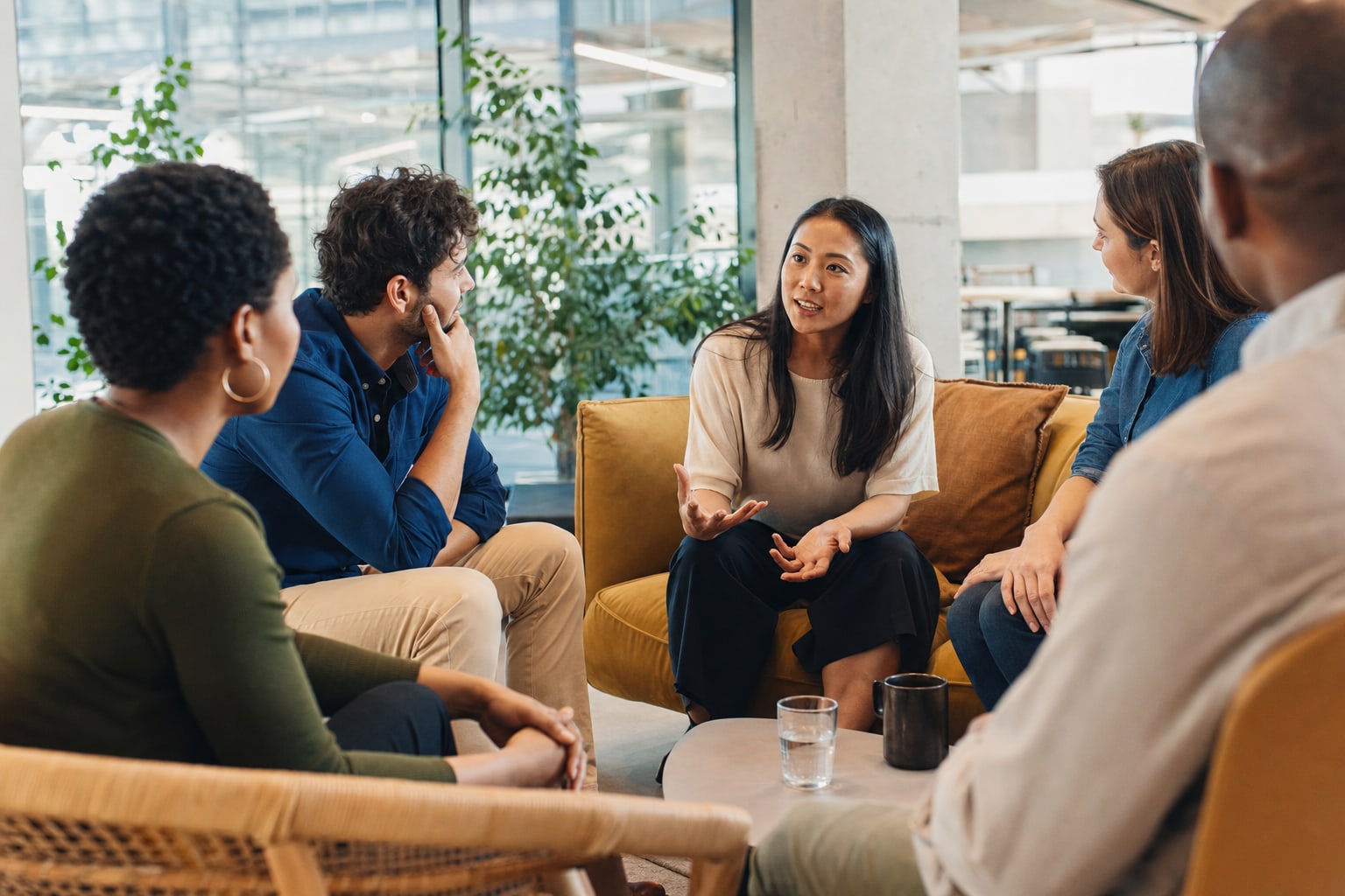 Colleagues taking part in a constructive listening discussion