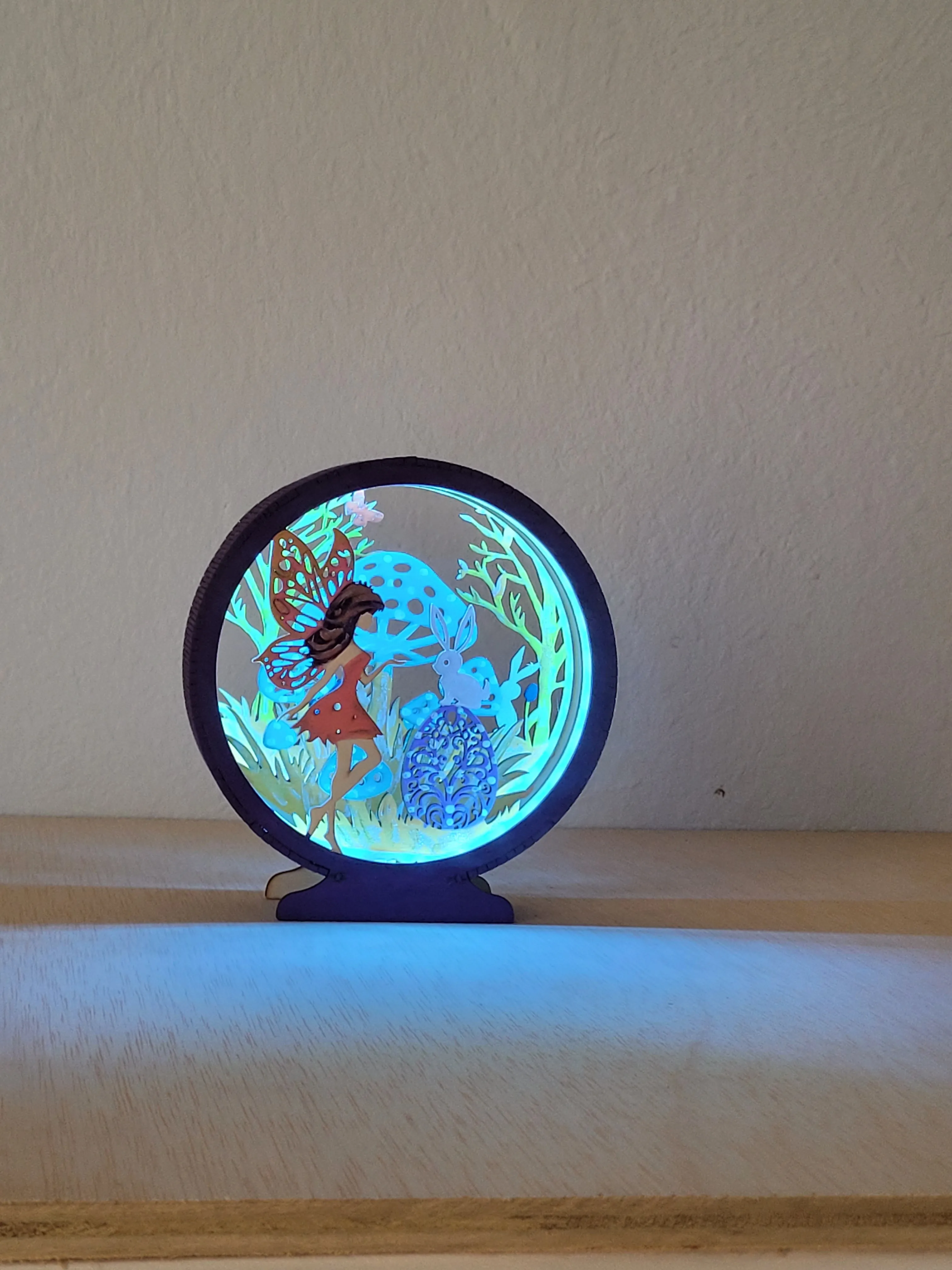 Handmade layered fairy shadow box with a detailed woodland design