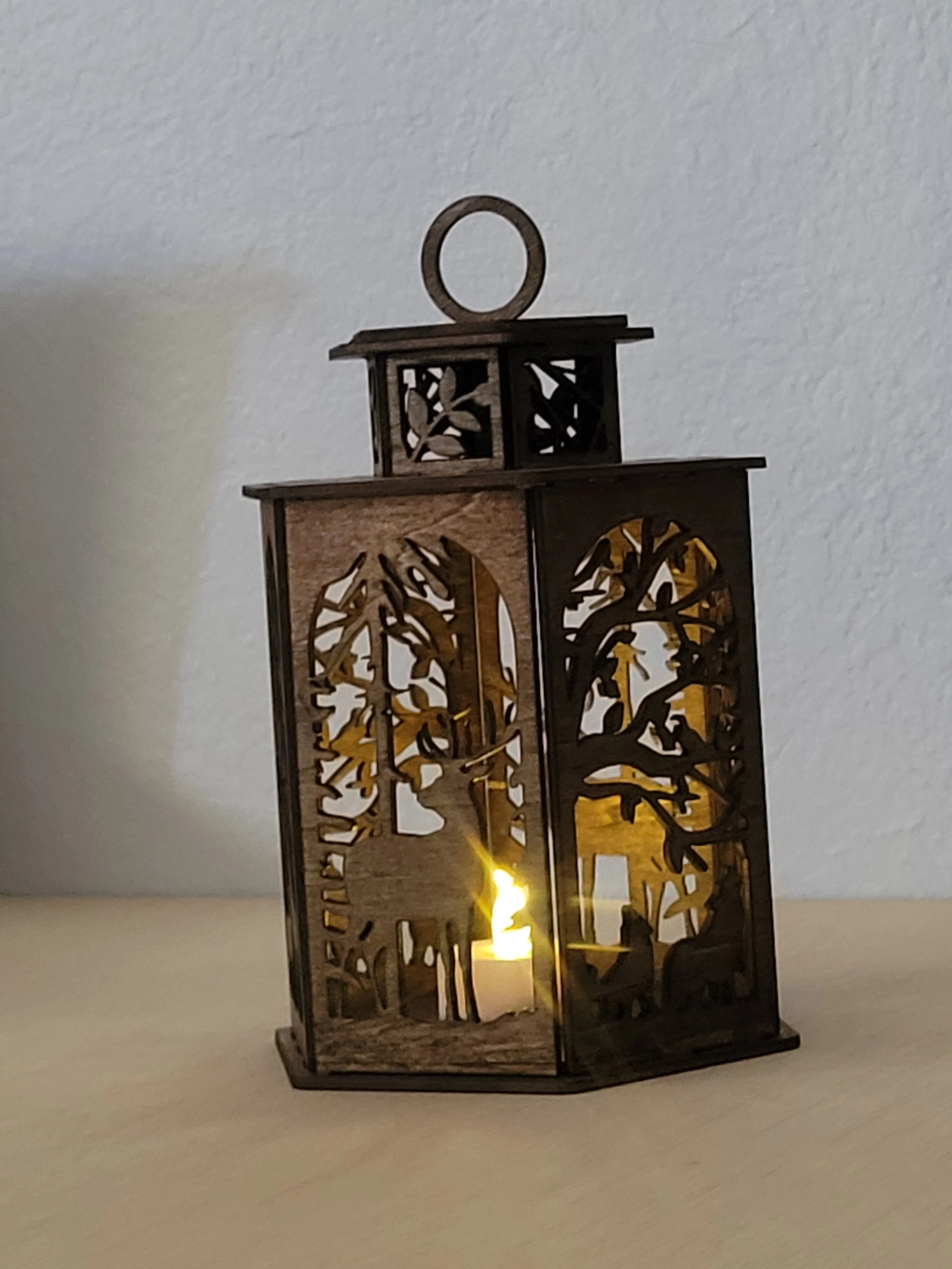 Laser-cut wood lamp displayed as a warm accent for a favorite room