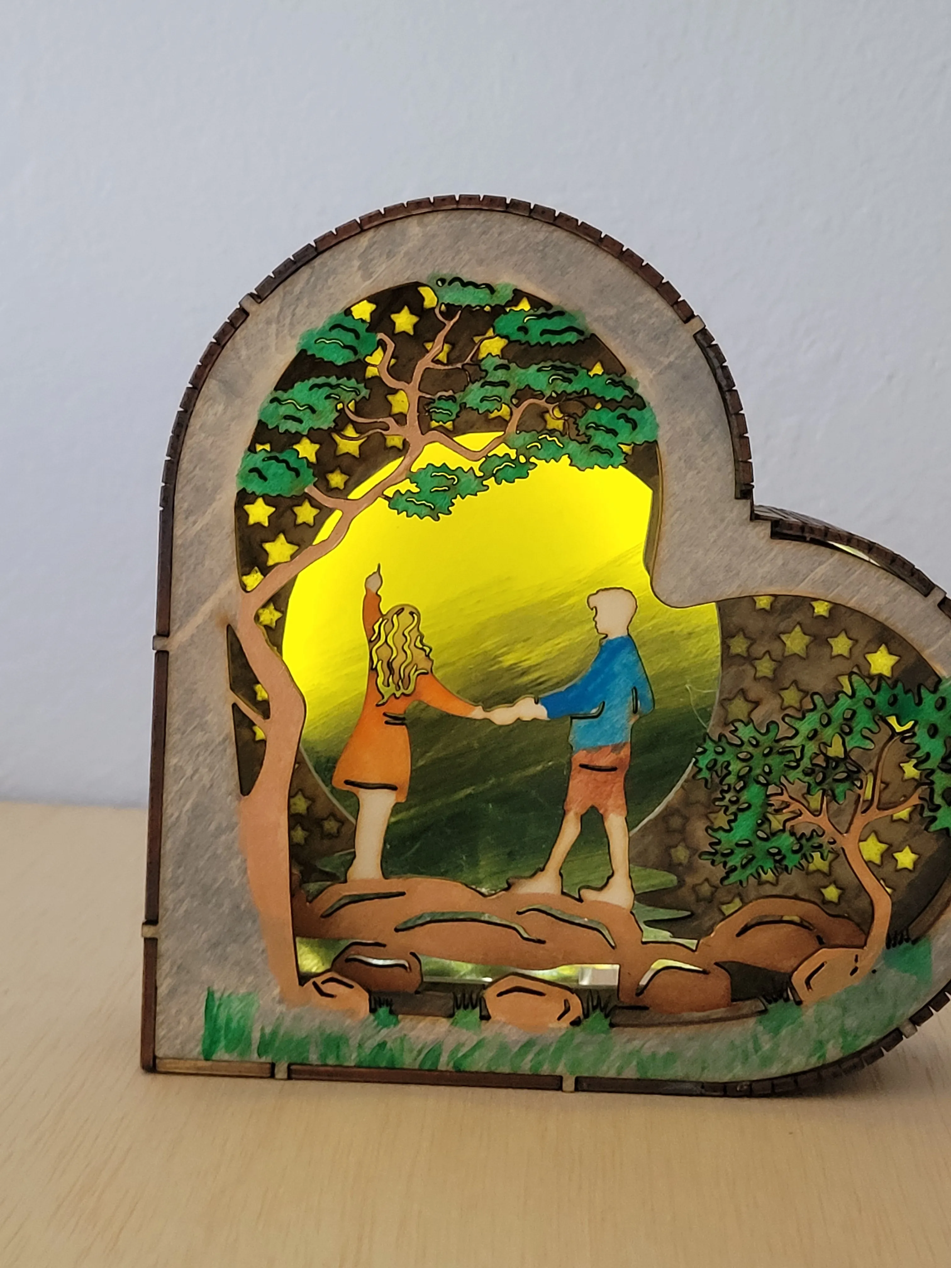 Heart-shaped layered wood shadow box made as a personal keepsake