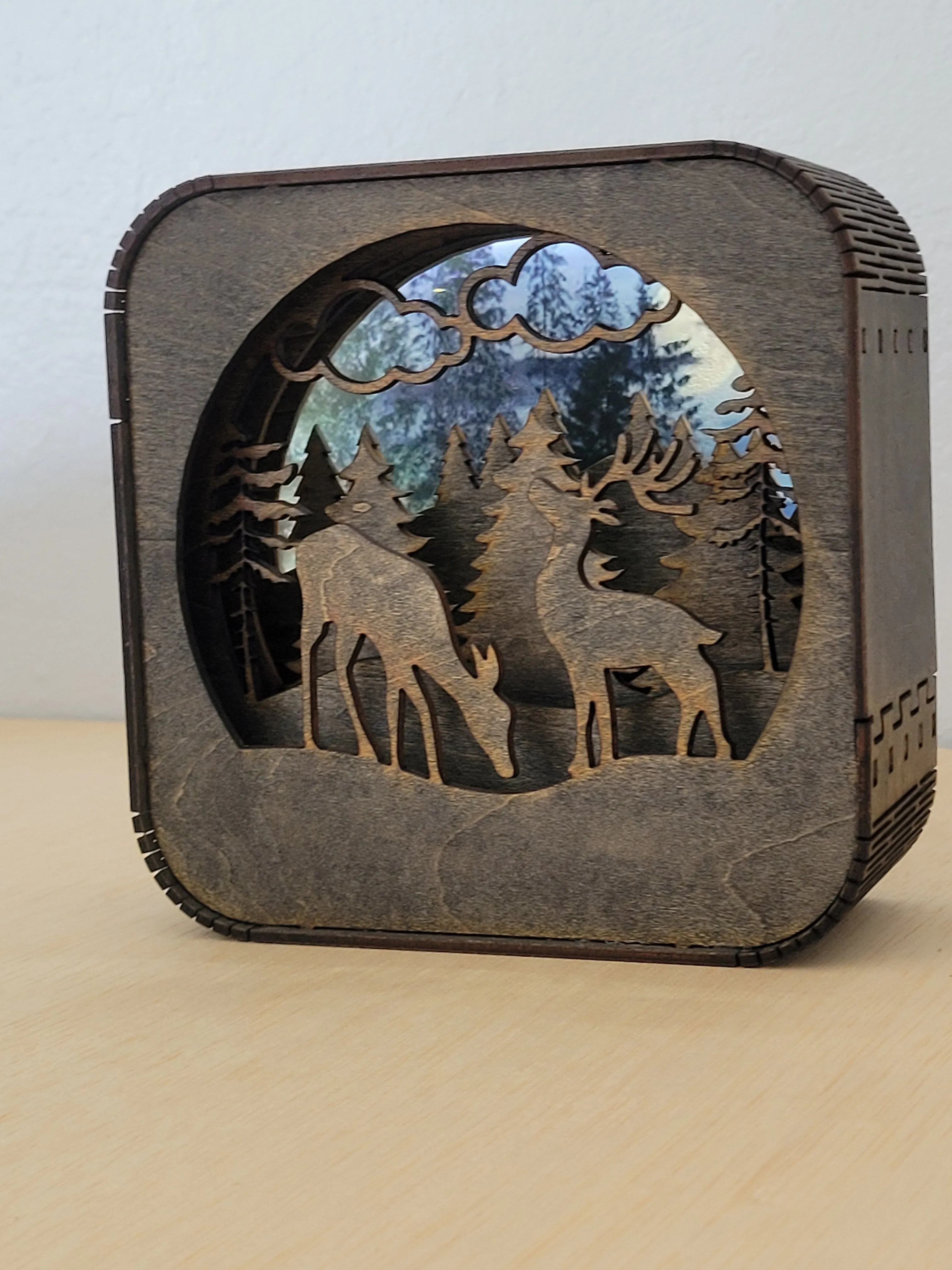 Layered handmade wood shadow box displayed as a welcoming shelf accent