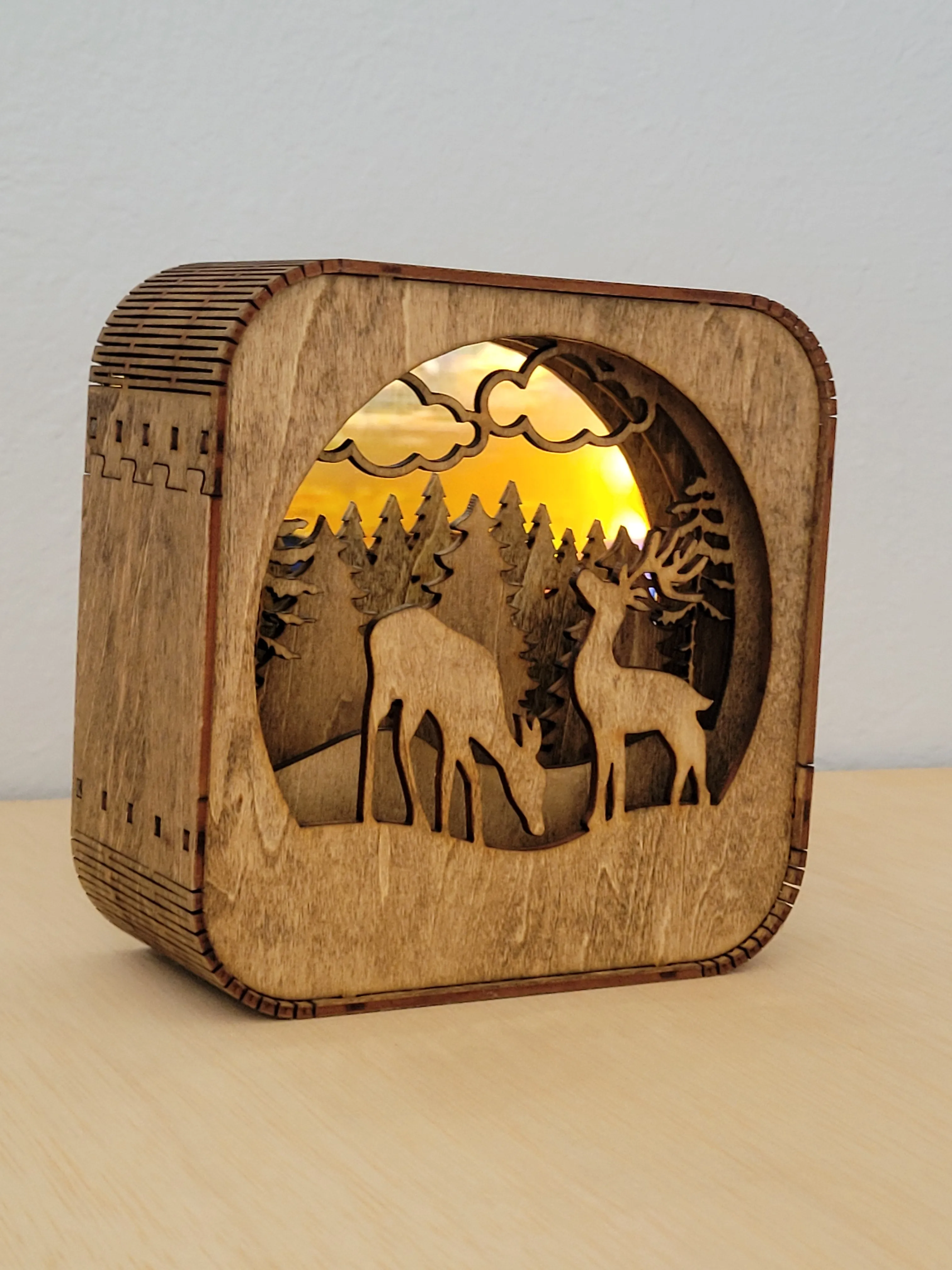 Layered handmade wood shadow box with a detailed forest scene