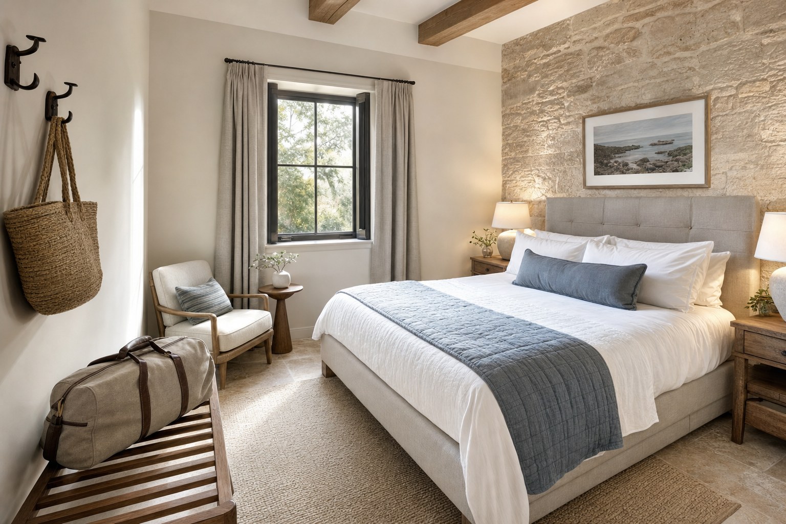Guest bedroom with bedside lighting, luggage bench, and calm layered bedding