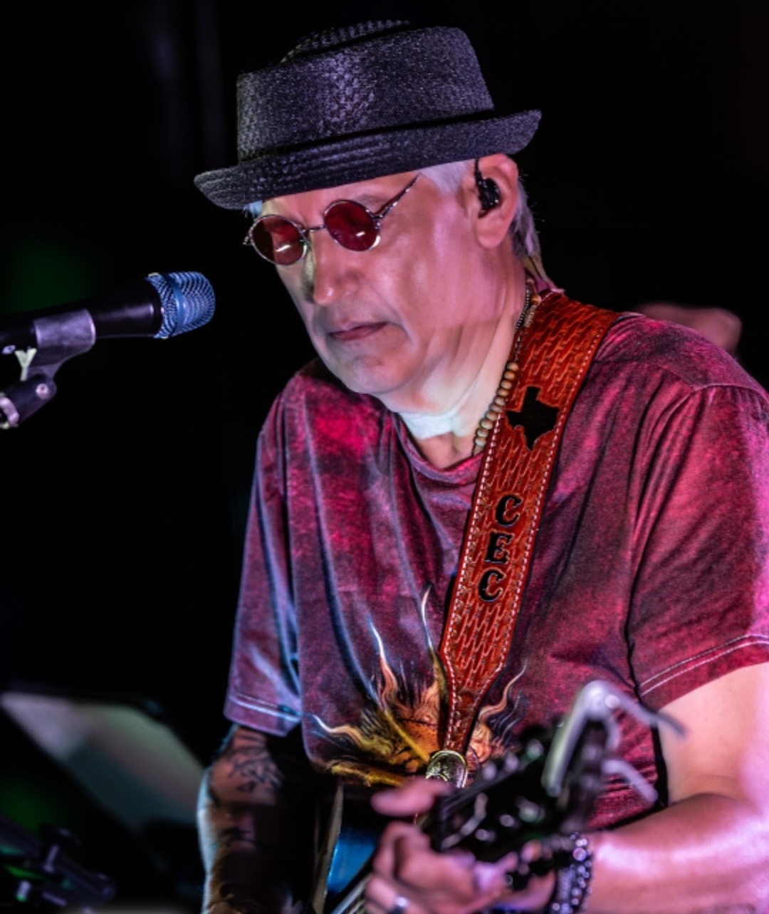Clyde's Electric Chalkboard performing together onstage