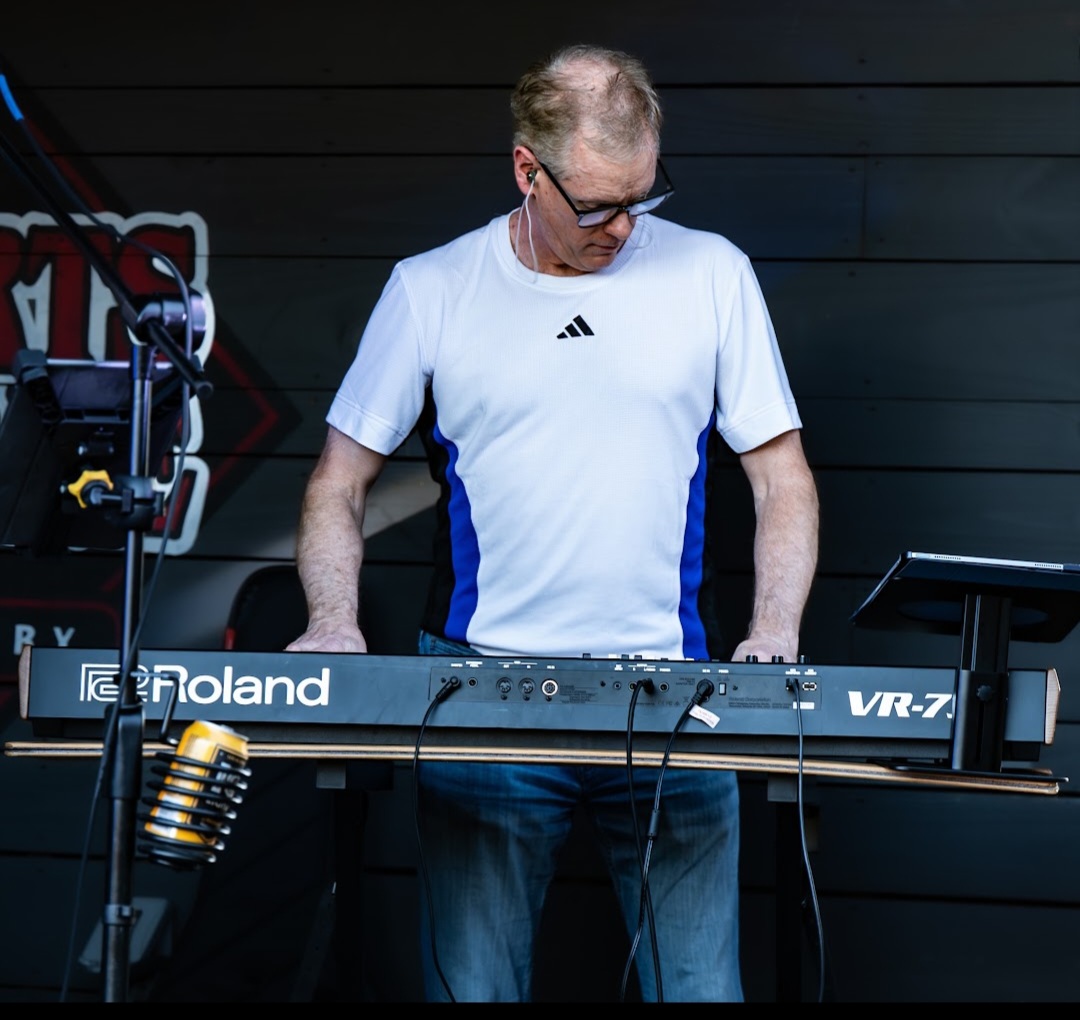 CEC keyboardist performing live