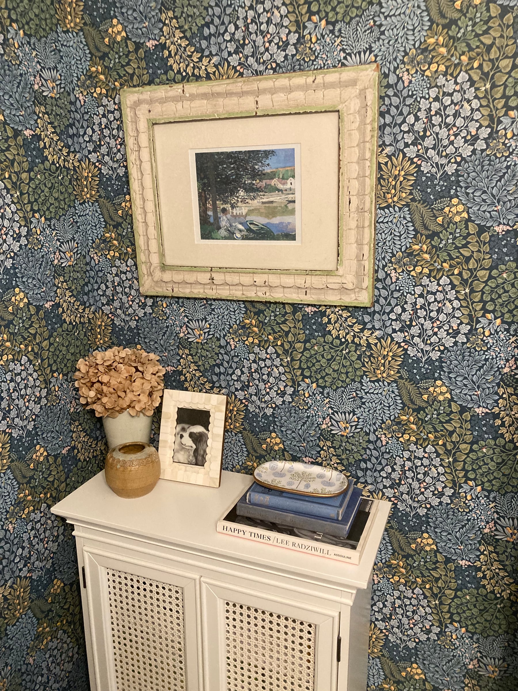 Finished blue floral wallpaper installation