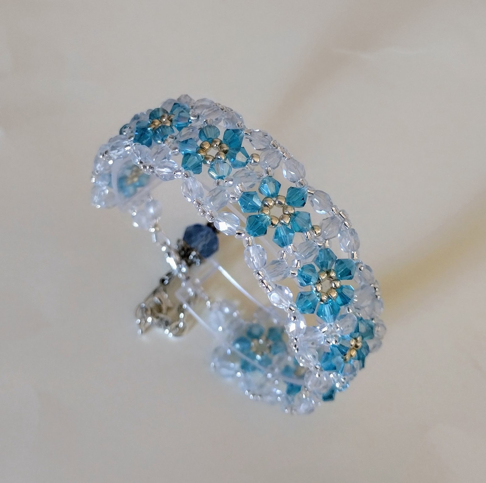Close view of Arctic Kiss Bracelet aqua crystal detail