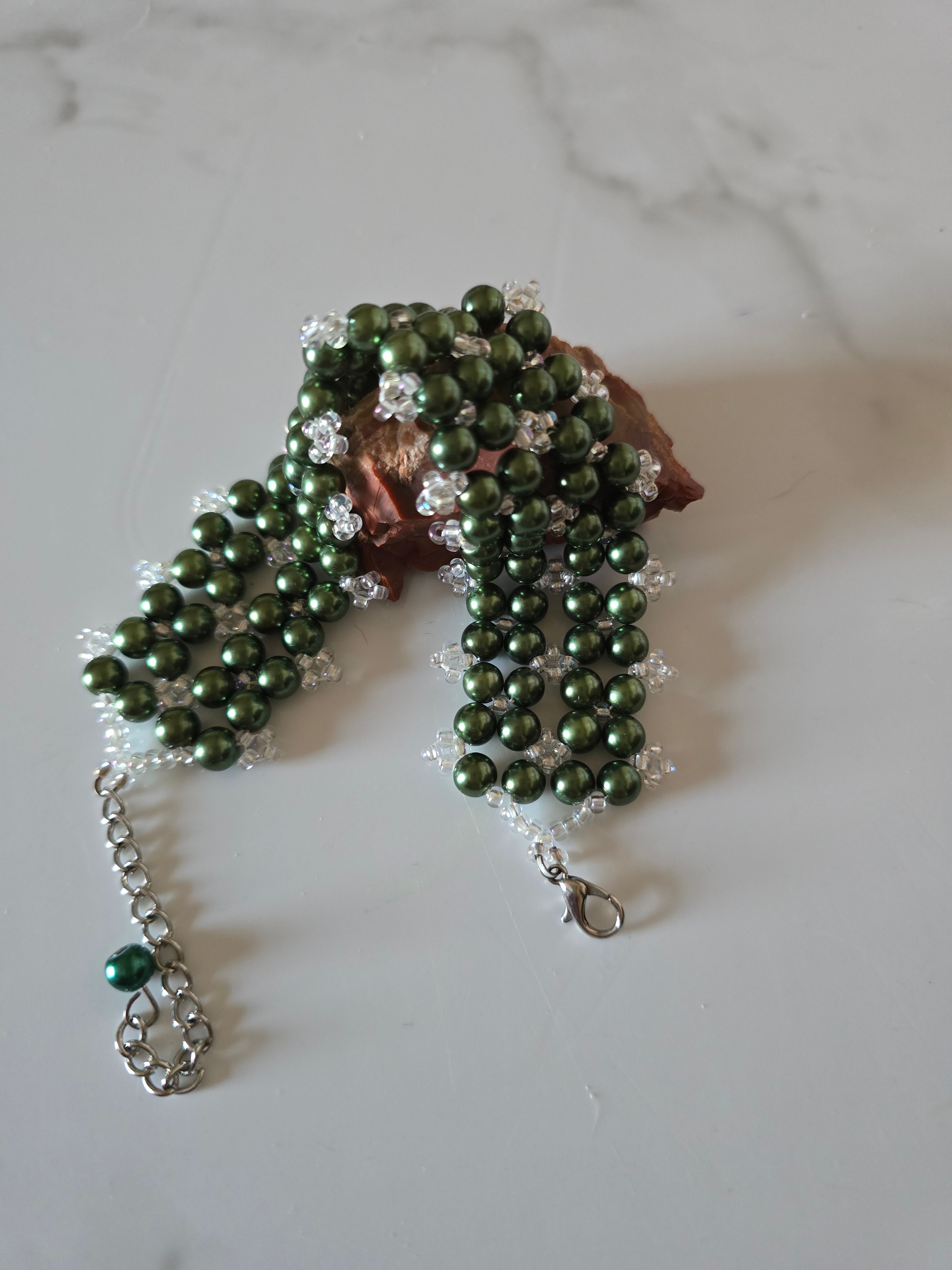 Forest Canopy green glass pearl cuff bracelet arranged with a natural stone