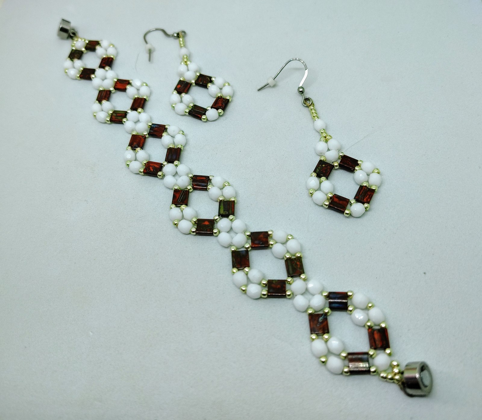 Picasso Red Tila bracelet and earrings arranged together