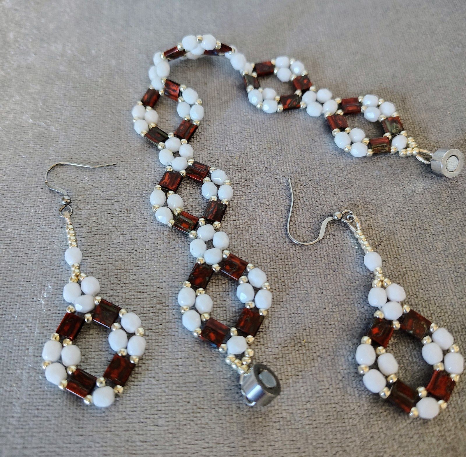 Close view of the Picasso Red Tila bracelet and earring set