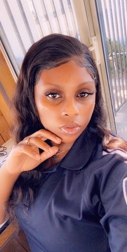 U. wearing HookedOnBundles hair