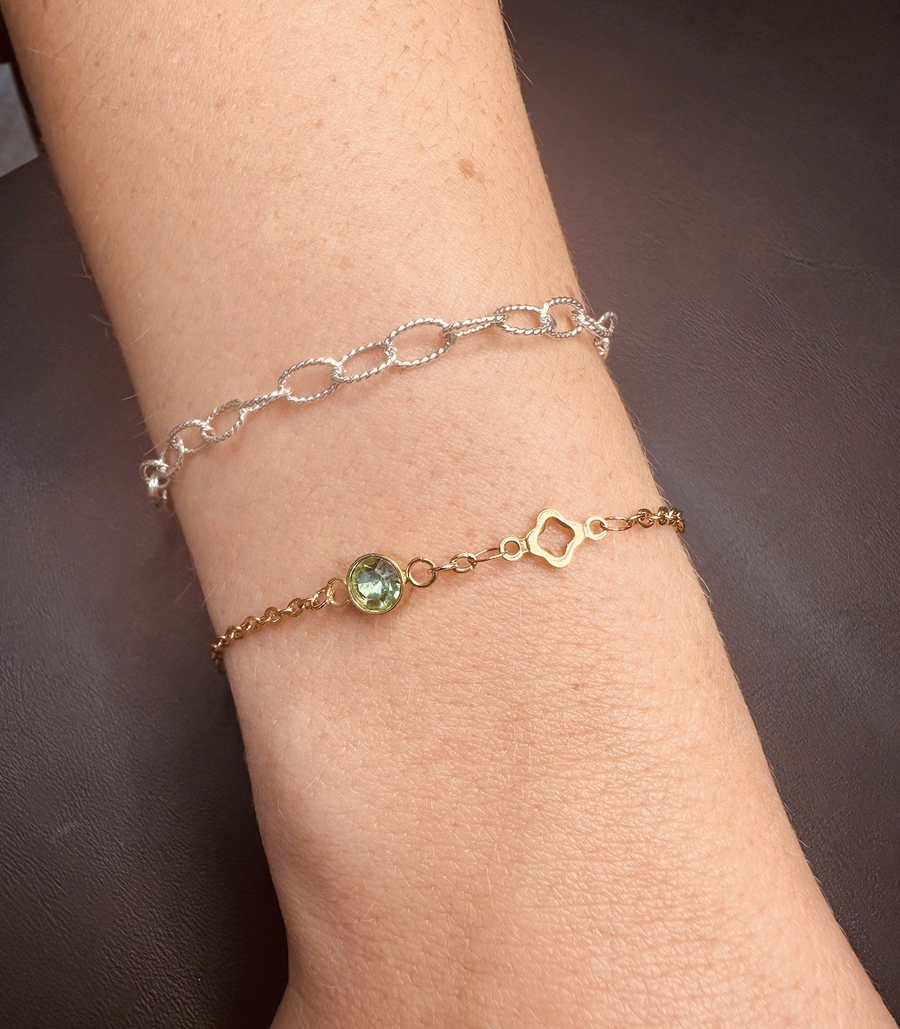 Permanent jewelry detail on a client wrist