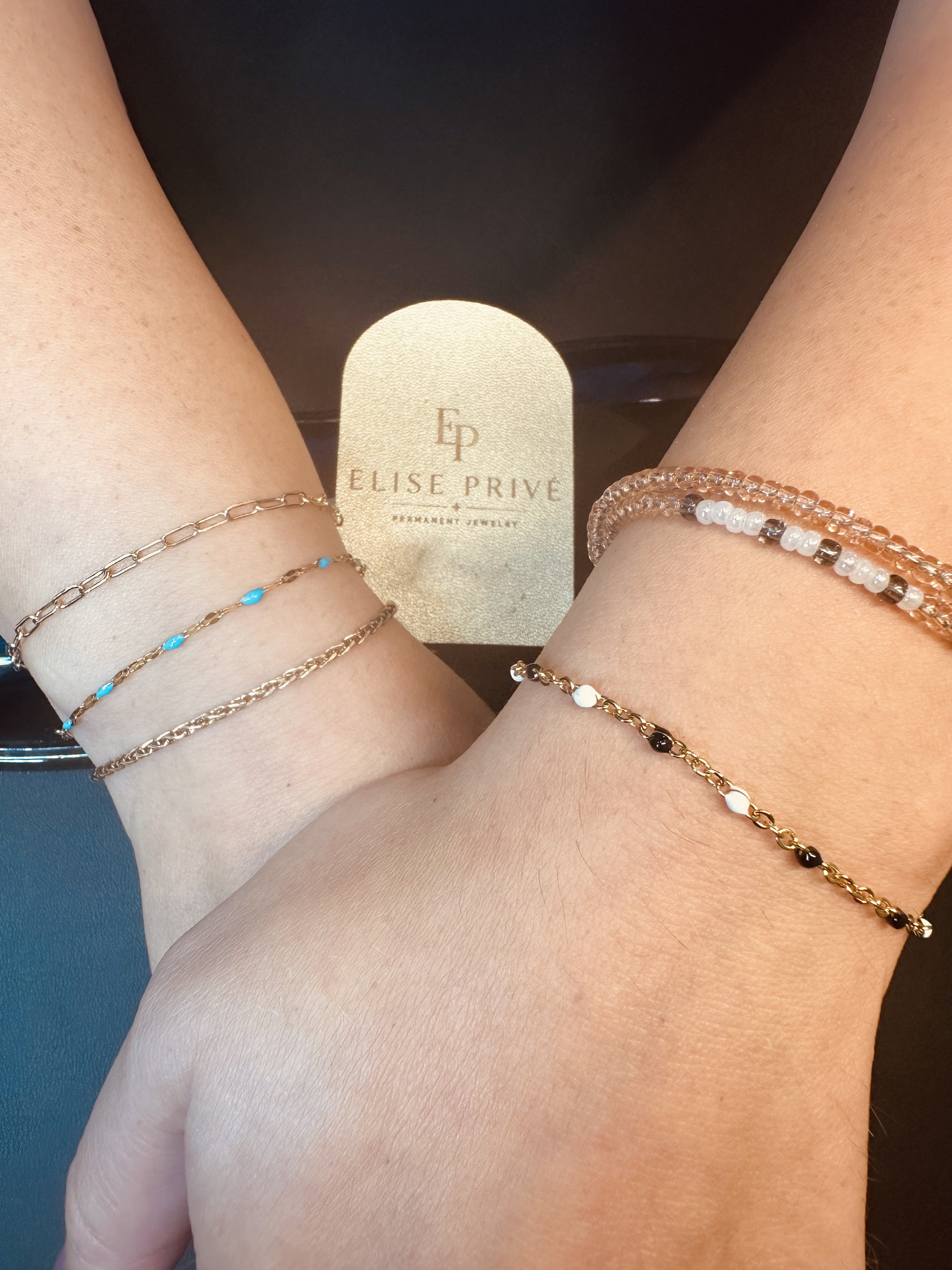 Client wearing permanent jewelry
